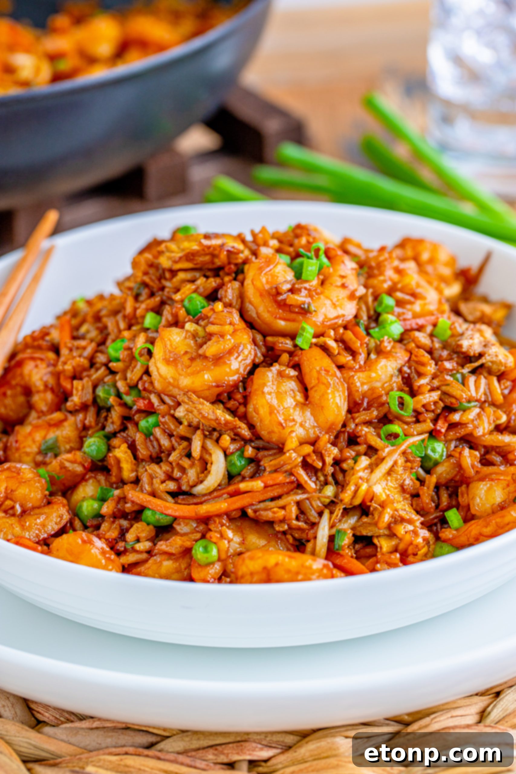 Golden Shrimp Fried Rice 8 Ingredients for shrimp fried rice, including shrimp, eggs, vegetables, and seasonings, neatly arranged.