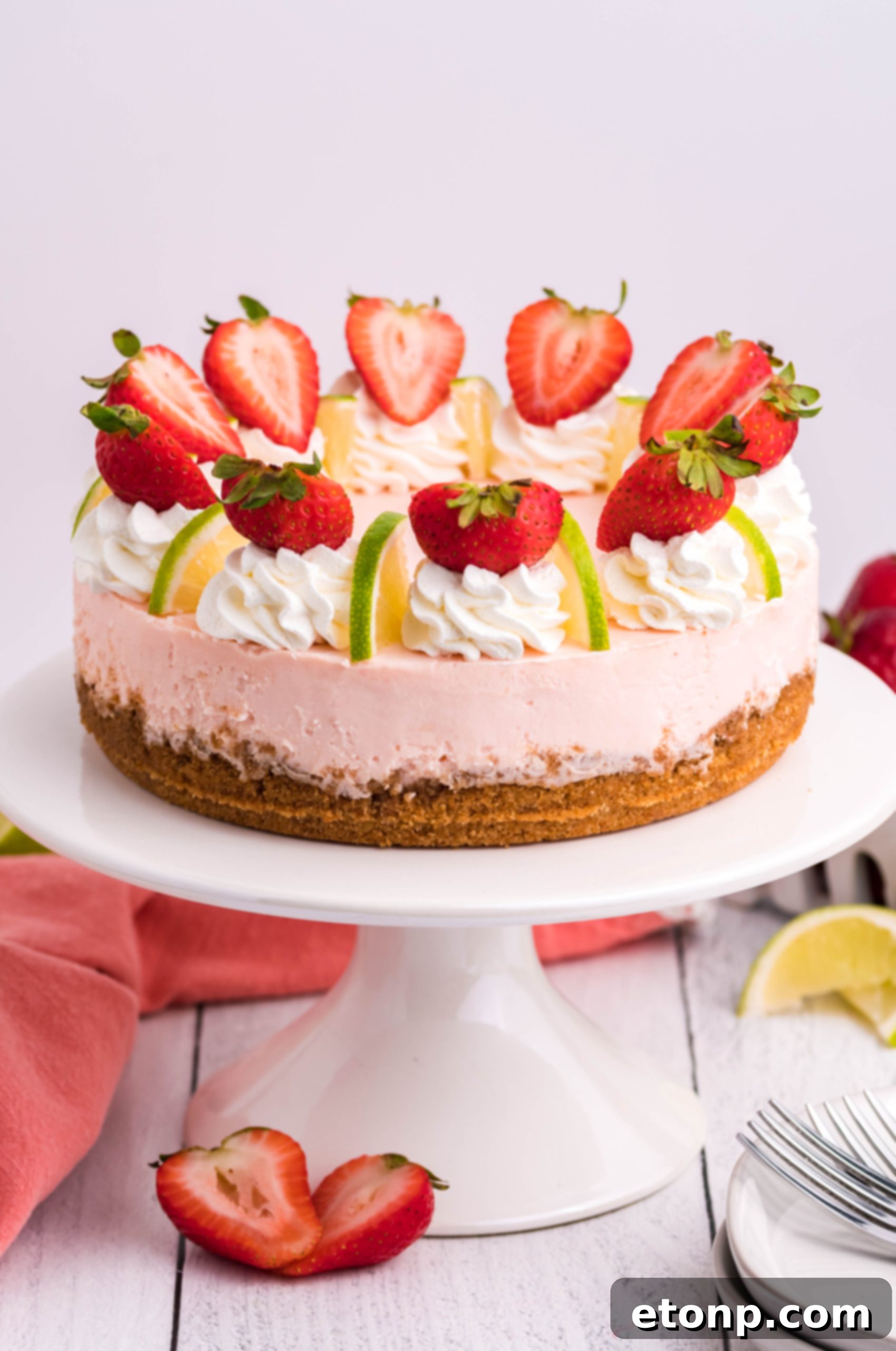 Vibrant Instant Pot Strawberry Daiquiri Cheesecake 3 Close-up of a slice of Instant Pot Strawberry Daiquiri Cheesecake