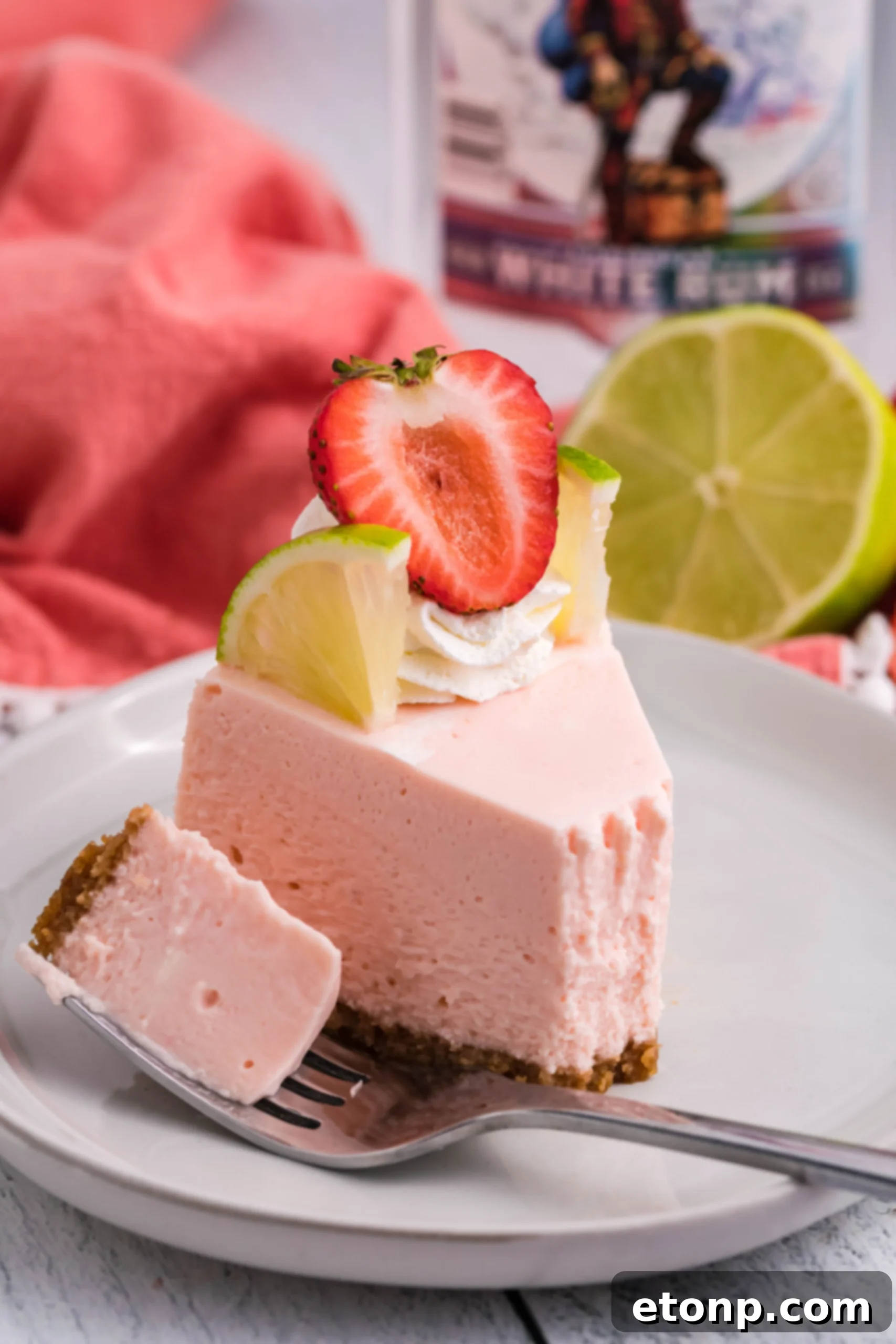 Vibrant Instant Pot Strawberry Daiquiri Cheesecake 5 Full view of Instant Pot Strawberry Daiquiri Cheesecake with toppings