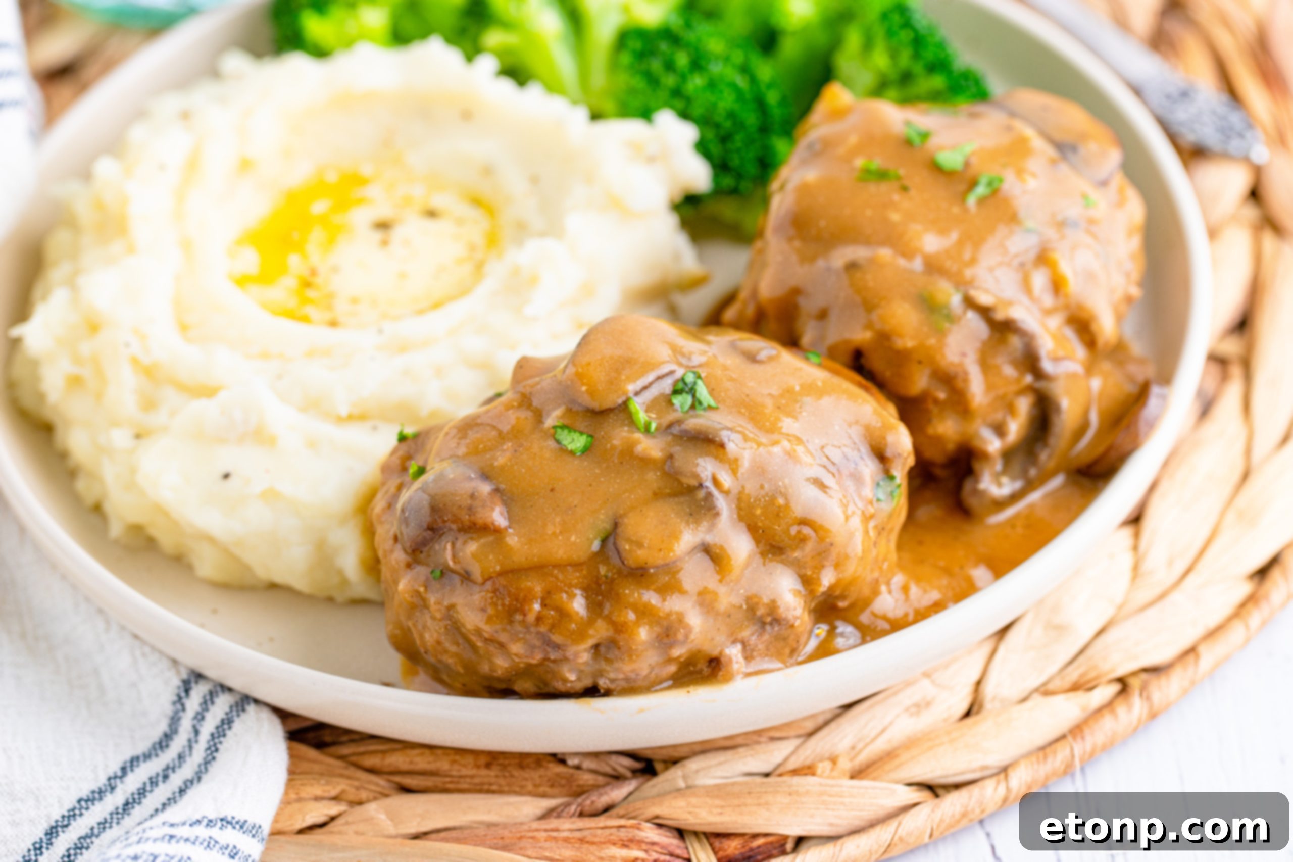 Salisbury Steak in skillet with gravy
