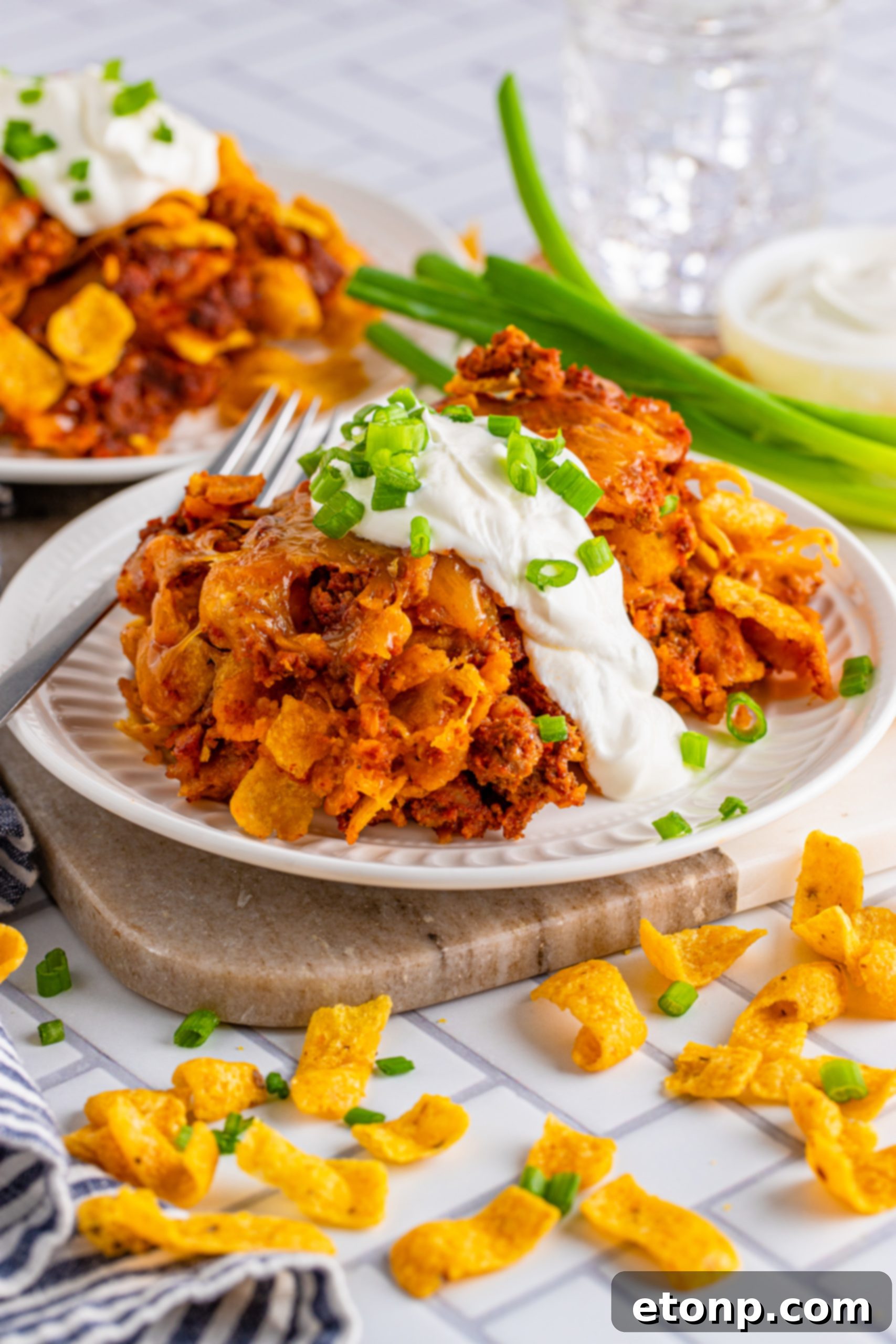 A large serving of Frito Chili Casserole on a plate