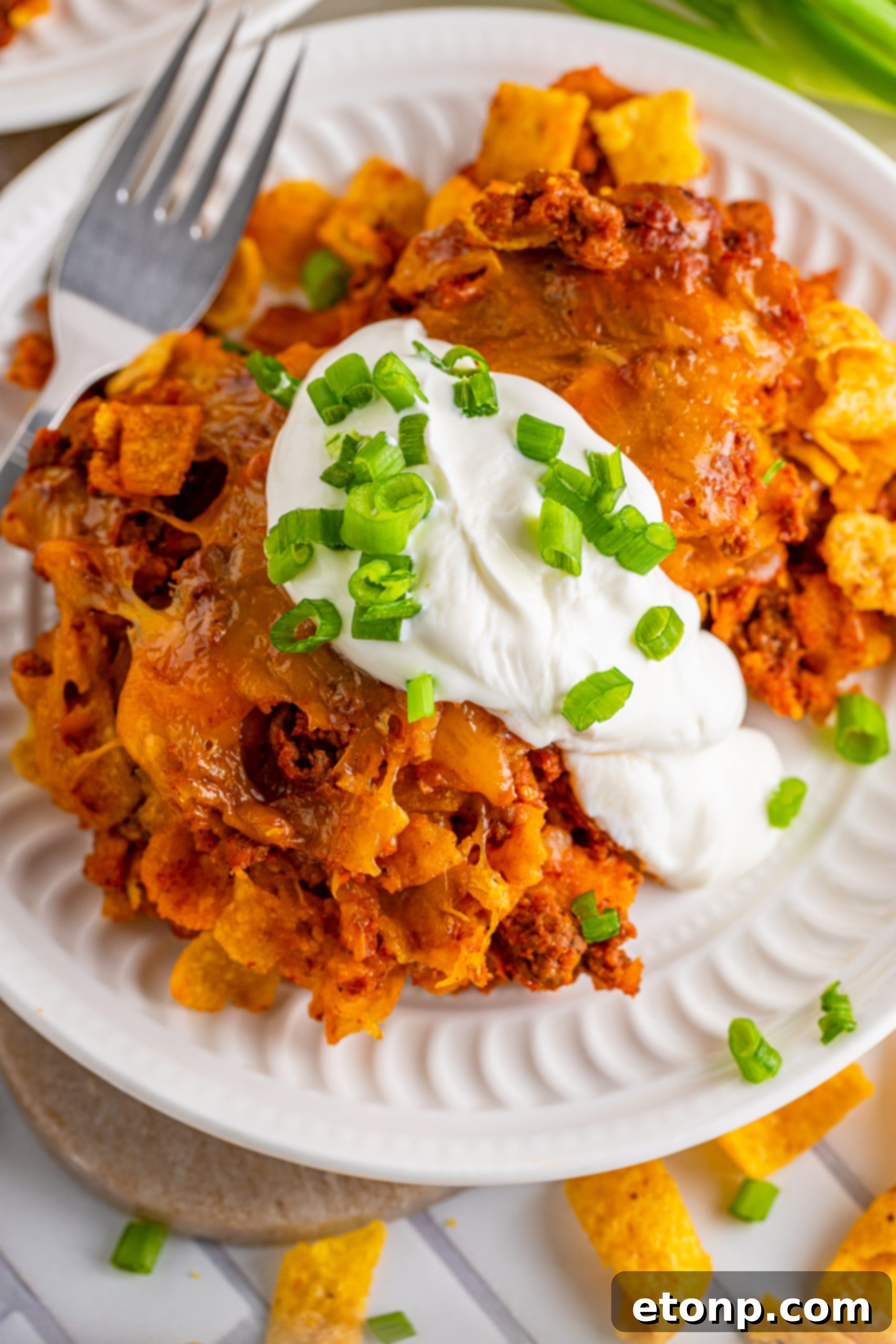 Ingredients for Frito Chili Casserole on a wooden board