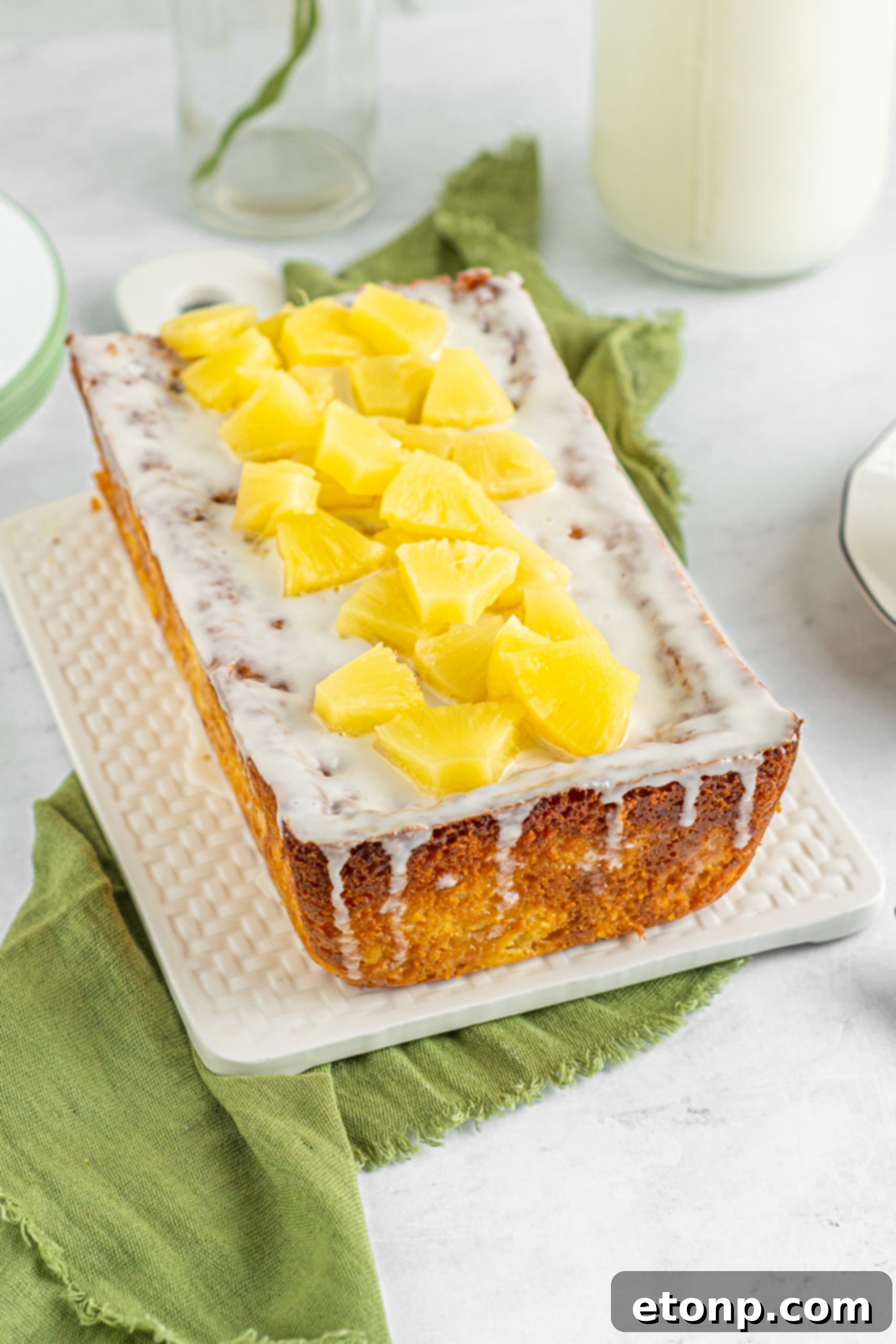 Sliced pineapple loaf cake, showing its moist texture