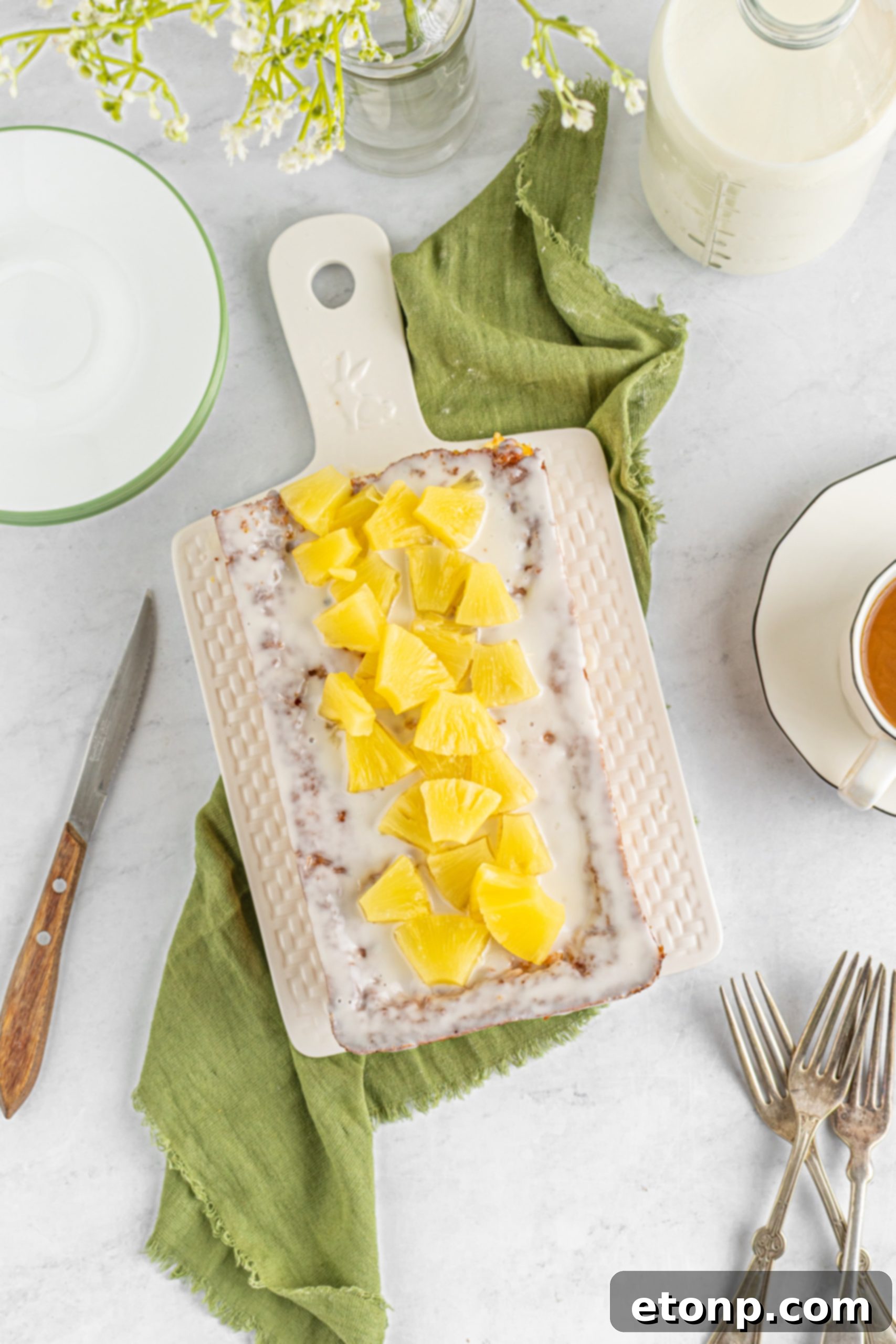 Pineapple loaf cake cooling on a wire rack