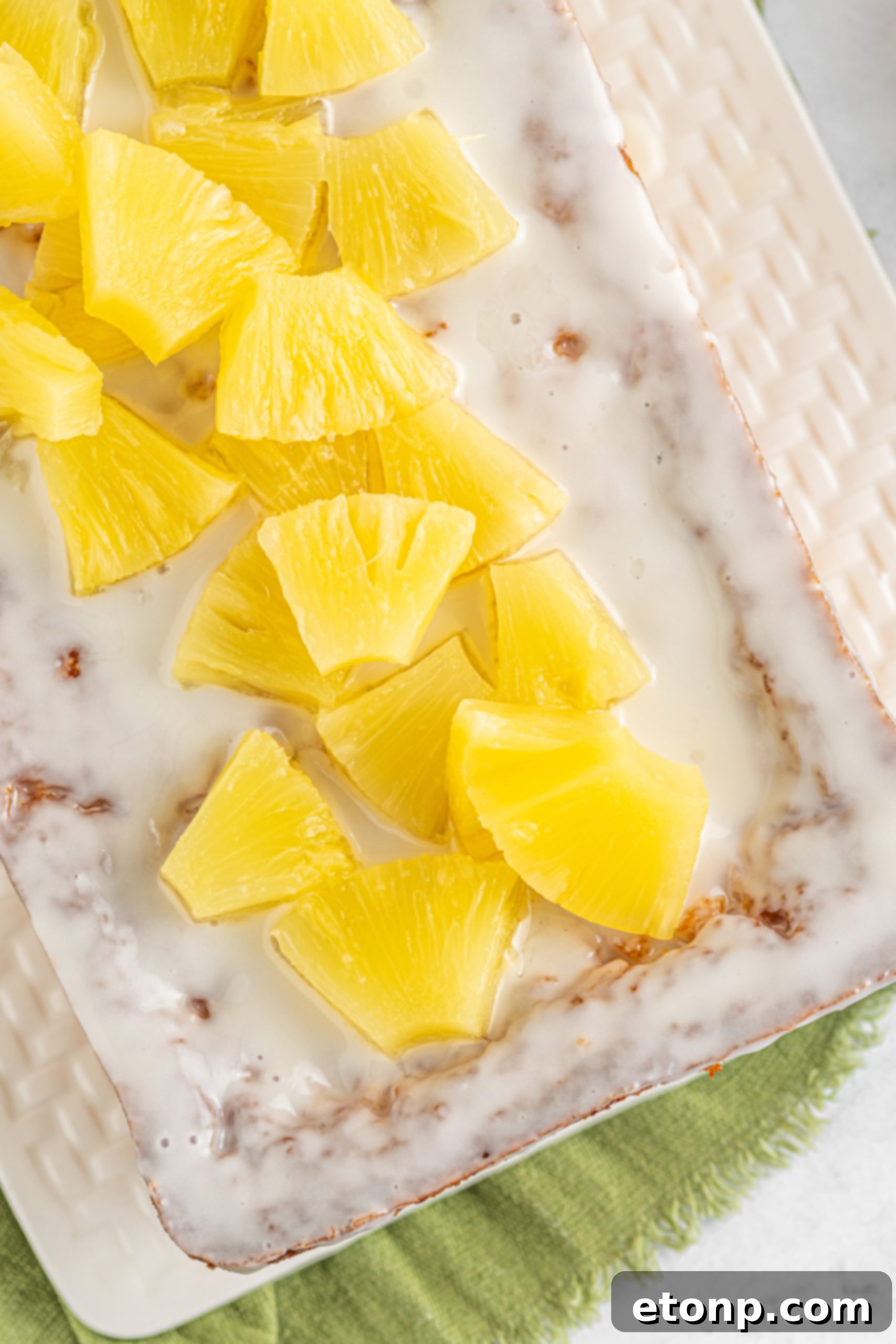 Pineapple loaf cake with glaze drizzled on top