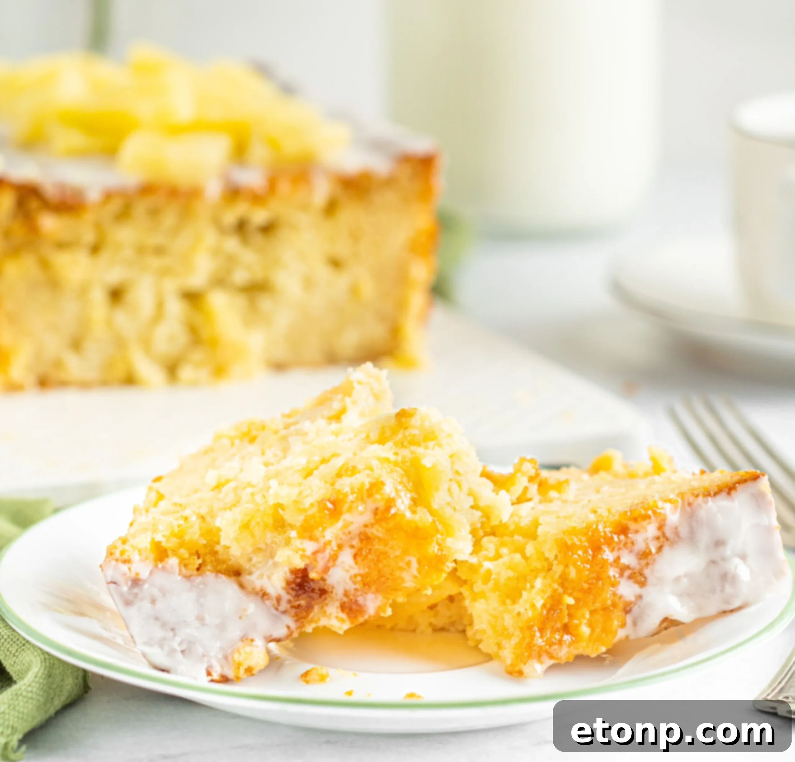 A slice of moist pineapple loaf cake with glaze