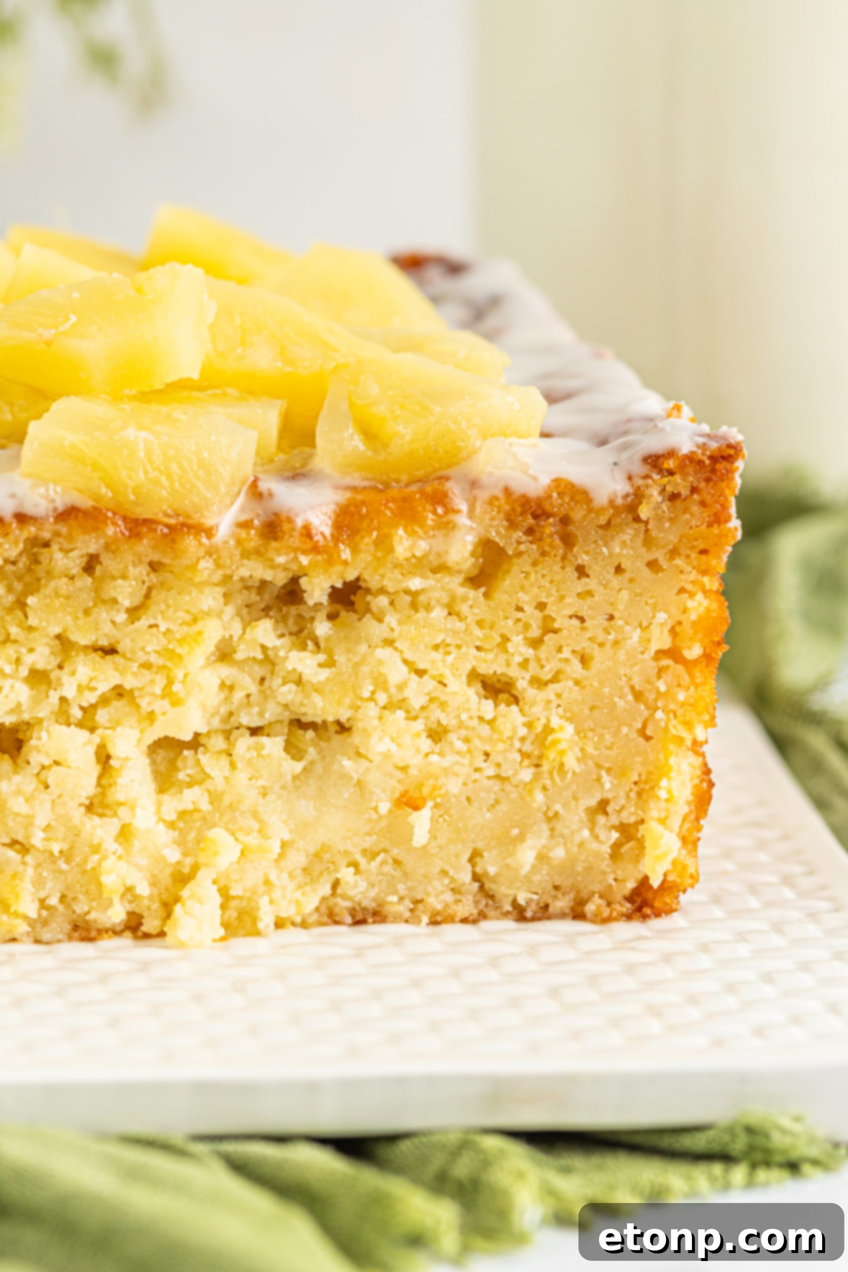 Pineapple loaf cake with a generous layer of glaze