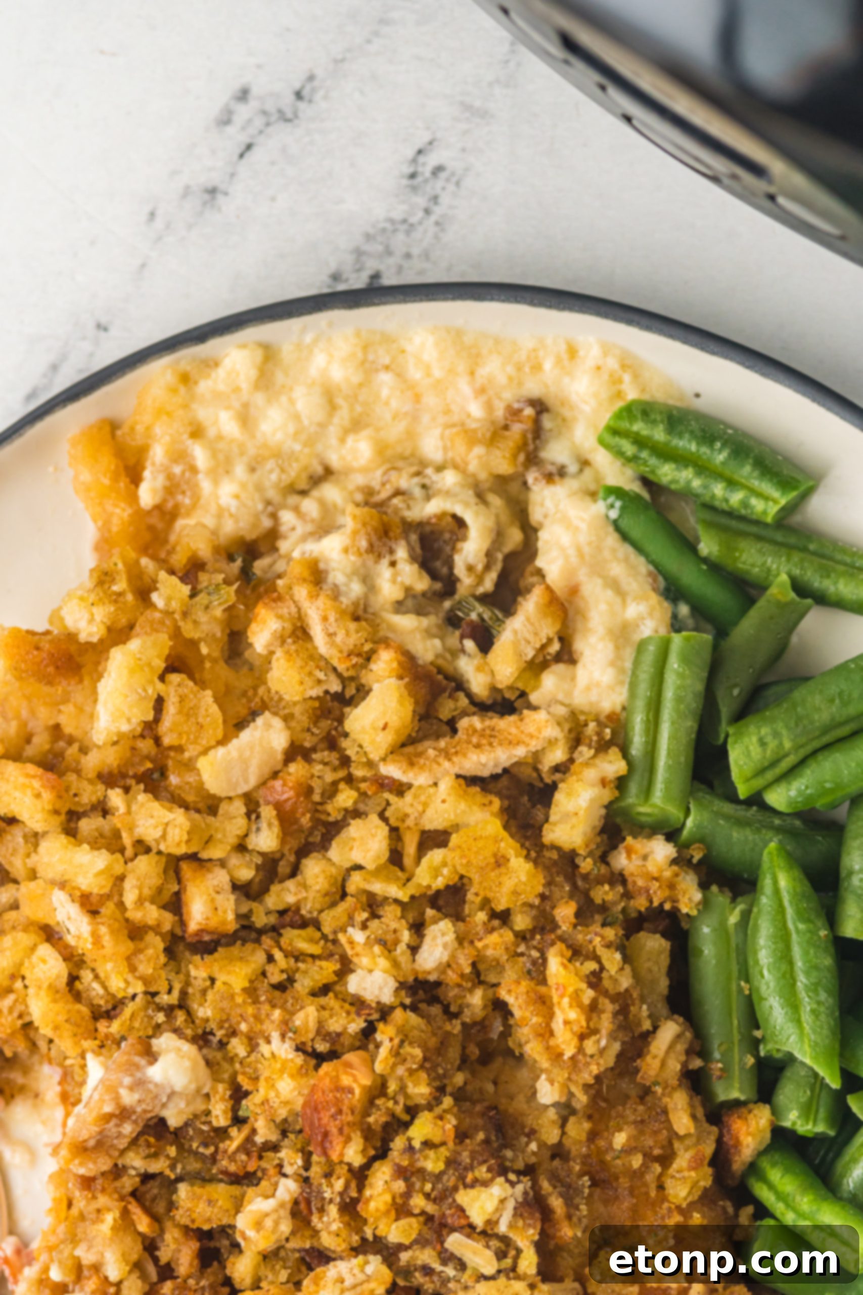 Slow Cooker Chicken Cordon Bleu with Savory Stuffing 7 Ingredients for Slow Cooker Chicken Cordon Bleu laid out on a cutting board.