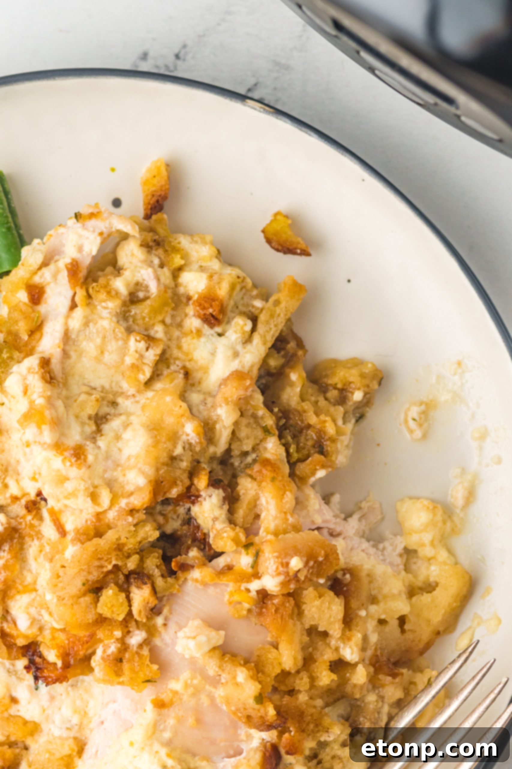 Slow Cooker Chicken Cordon Bleu with Savory Stuffing 8 Melted butter in a bowl, a key ingredient for the stuffing topping.