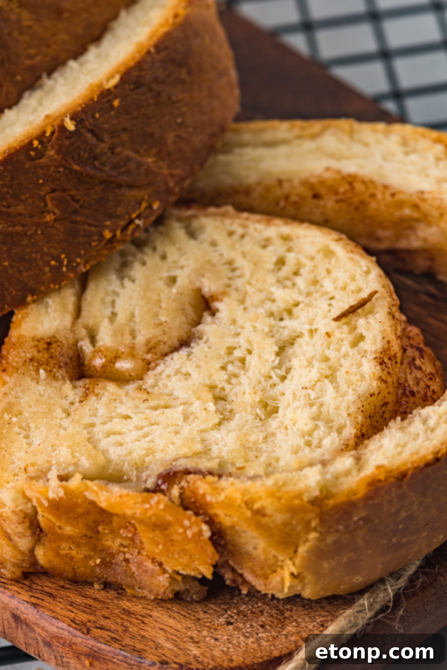 Warm slices of Amish White Bread on a wire rack