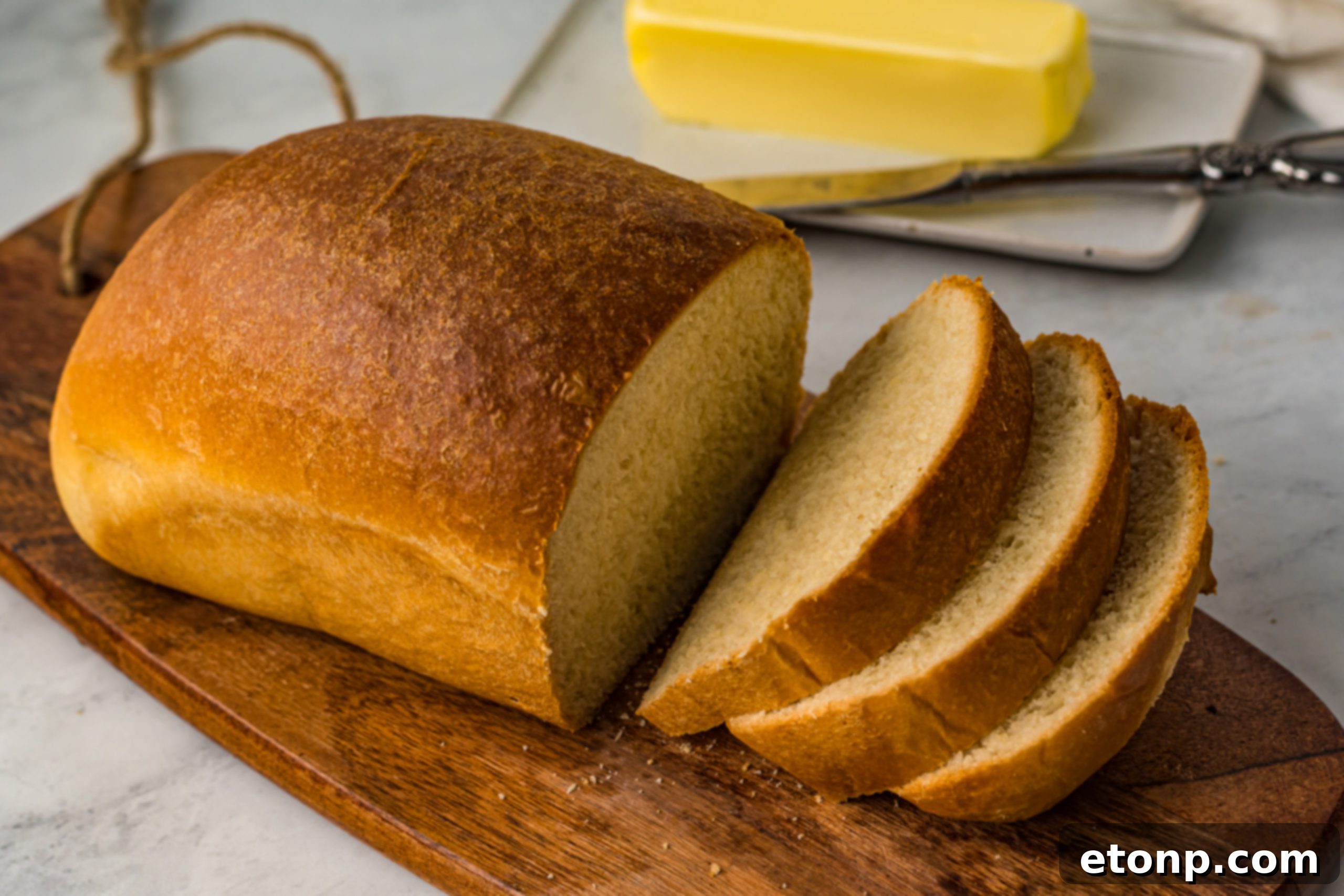 Amish White Bread dough in a mixing bowl