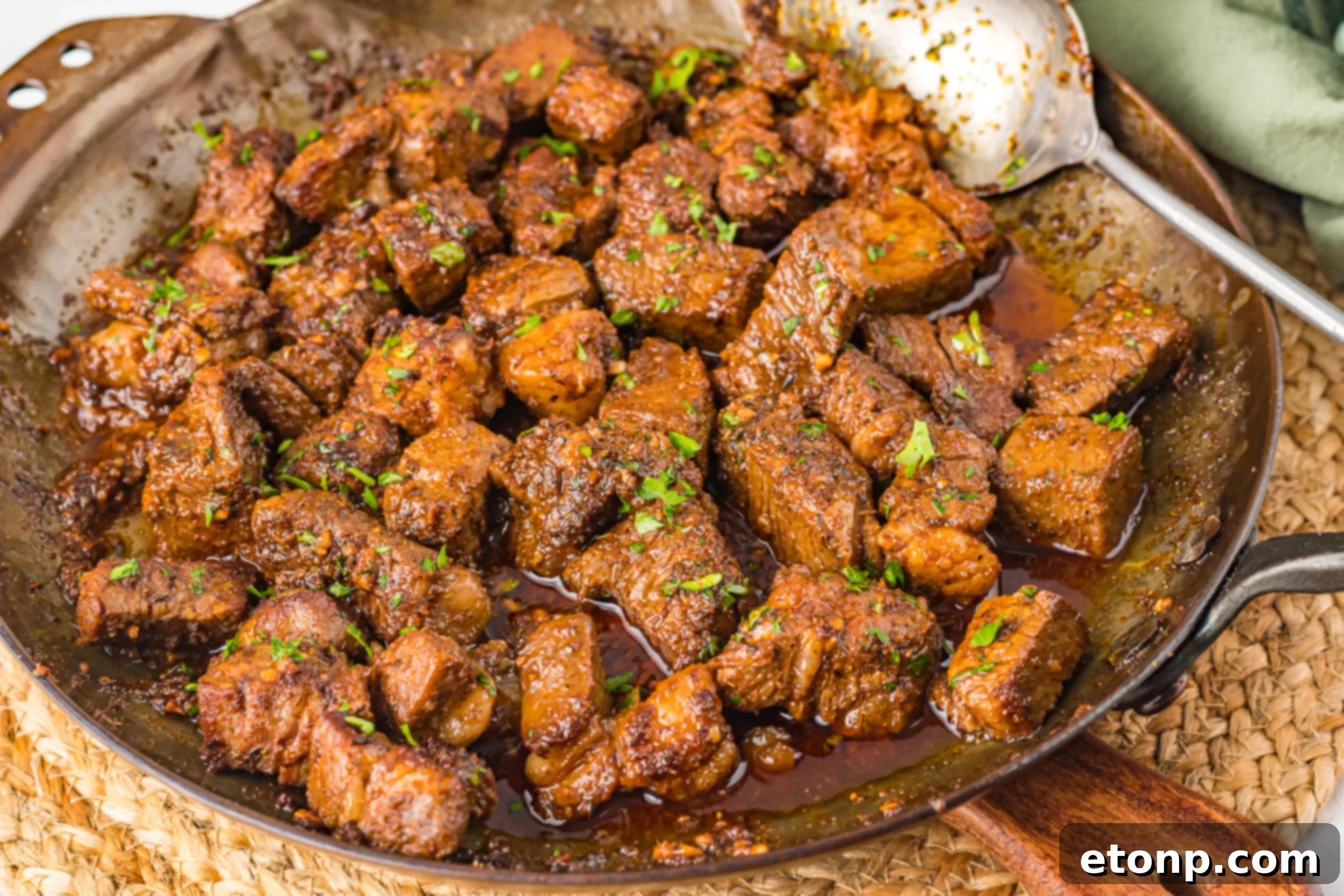 Savory Garlic Butter Steak Morsels 16 Steak cajun steak tips on a plate with sides