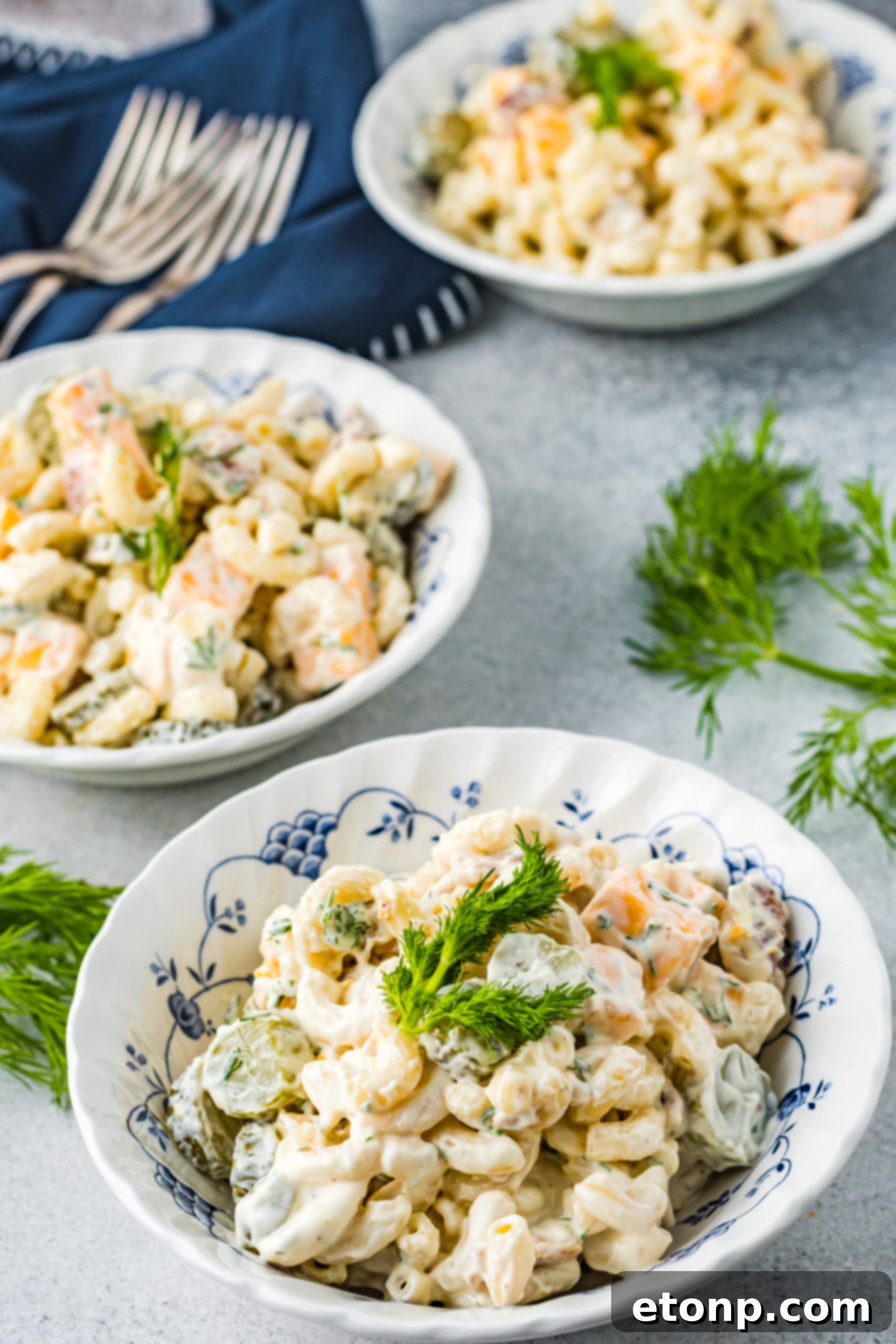 A final, enticing image of the Dill Pickle Pasta Salad in a large serving bowl, ready to be enjoyed.