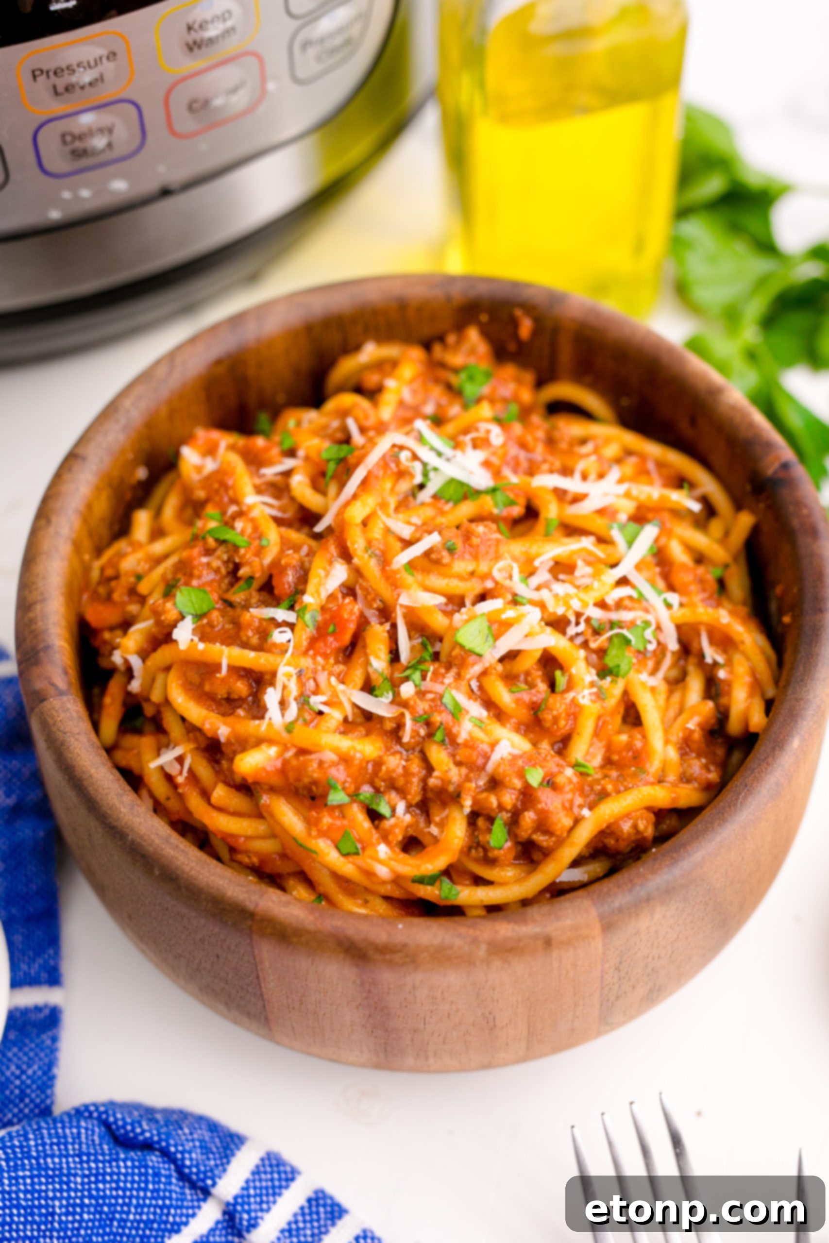 One-Pot Instant Pot Spaghetti 14 Overhead shot of Instant Pot Spaghetti in a wooden bowl