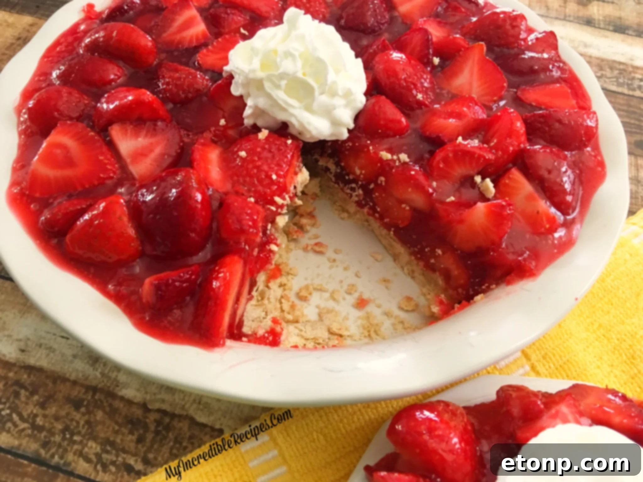 The Ultimate Strawberry Pie 11 Two slices of strawberry pie on plates, ready to be served