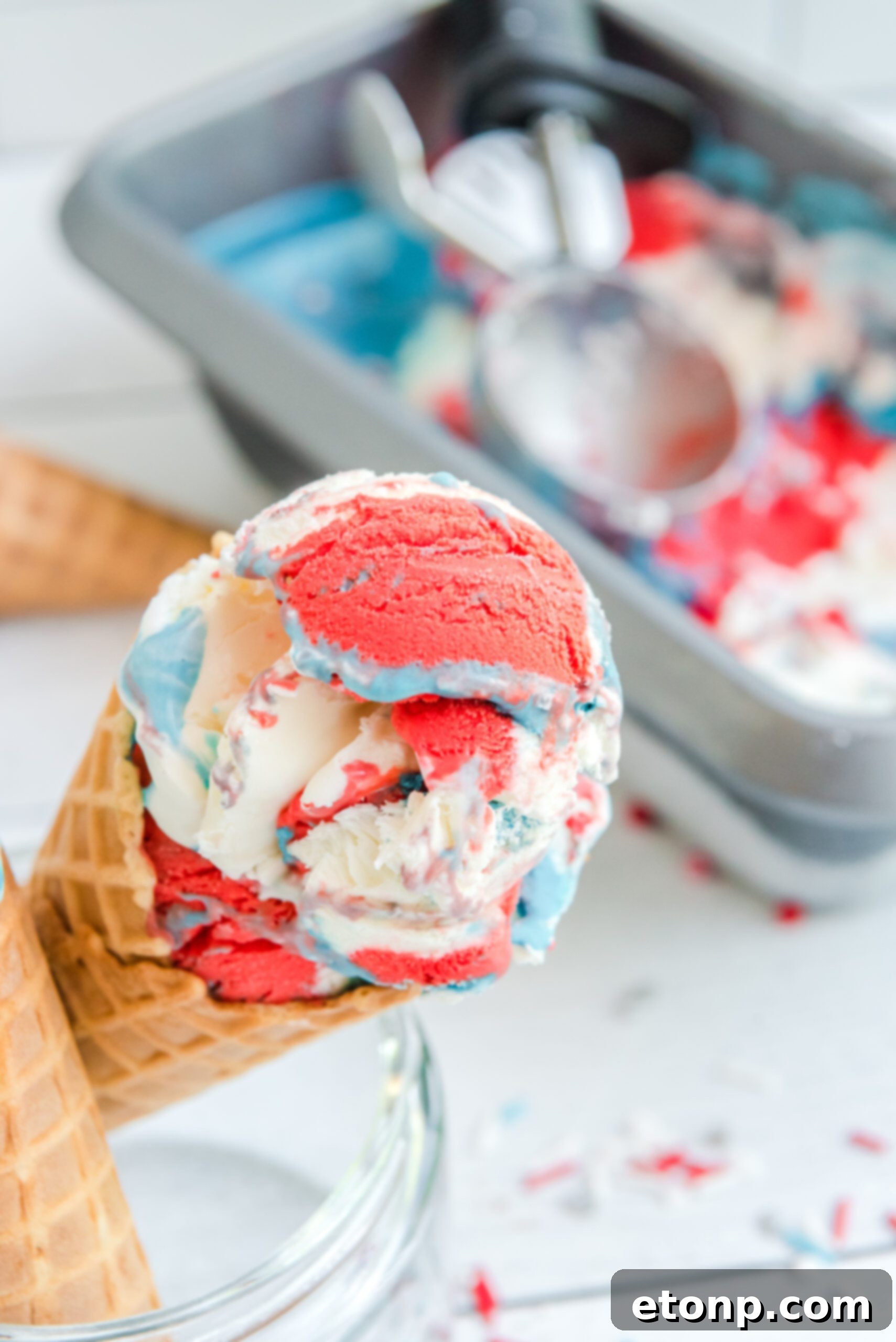 Red, White & Blue Ice Cream in a waffle cone