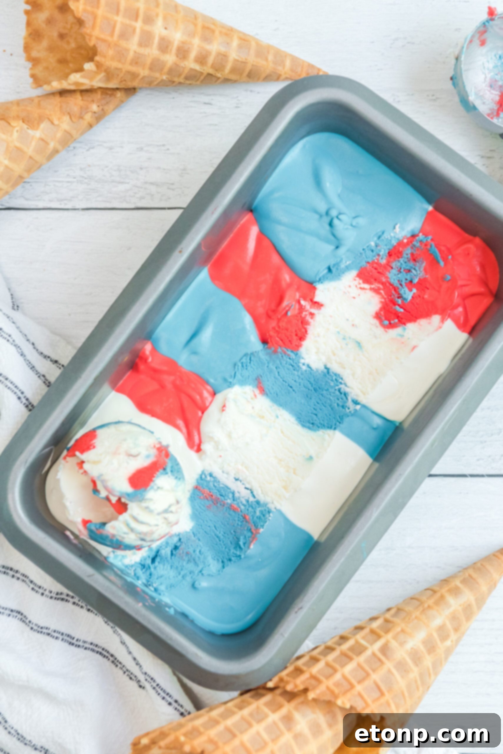 Red, White & Blue Ice Cream in an aluminum loaf pan, unscooped