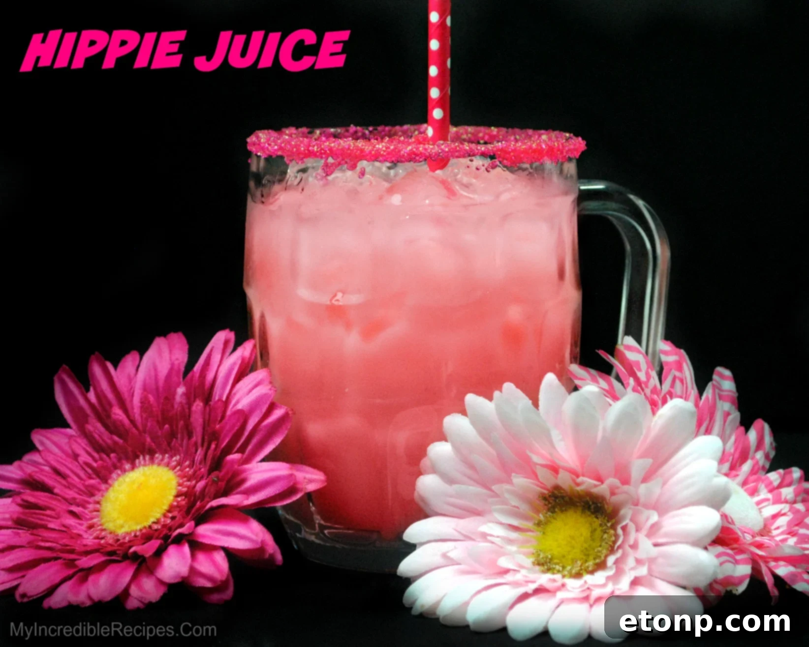 Two glasses of Hippie Juice, one with strawberry, one with watermelon garnish