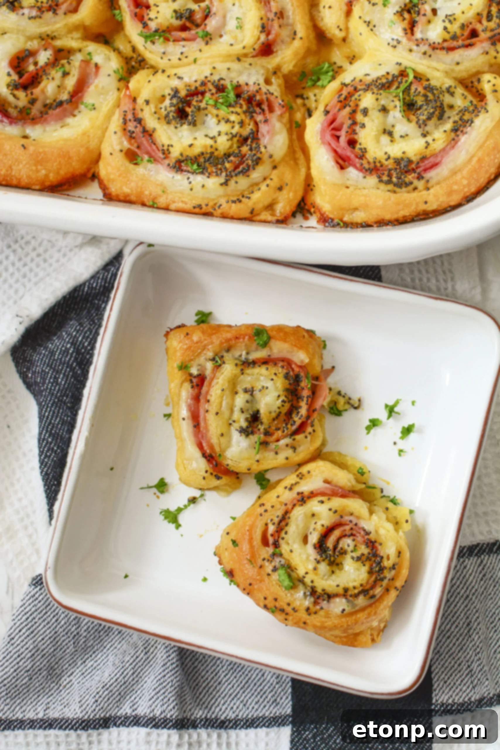 Ham and Cheese Pinwheels on a square white plate