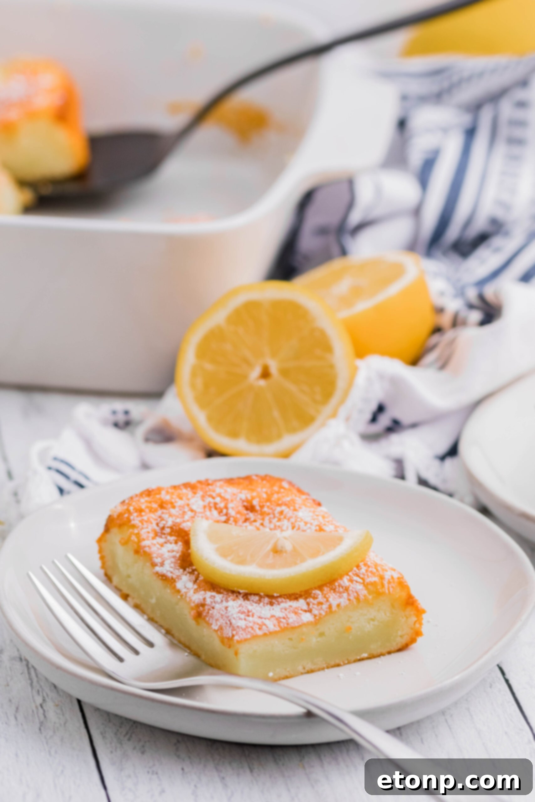 A far shot of the baked 2-Ingredient Lemon Bars in the pan, waiting to be served