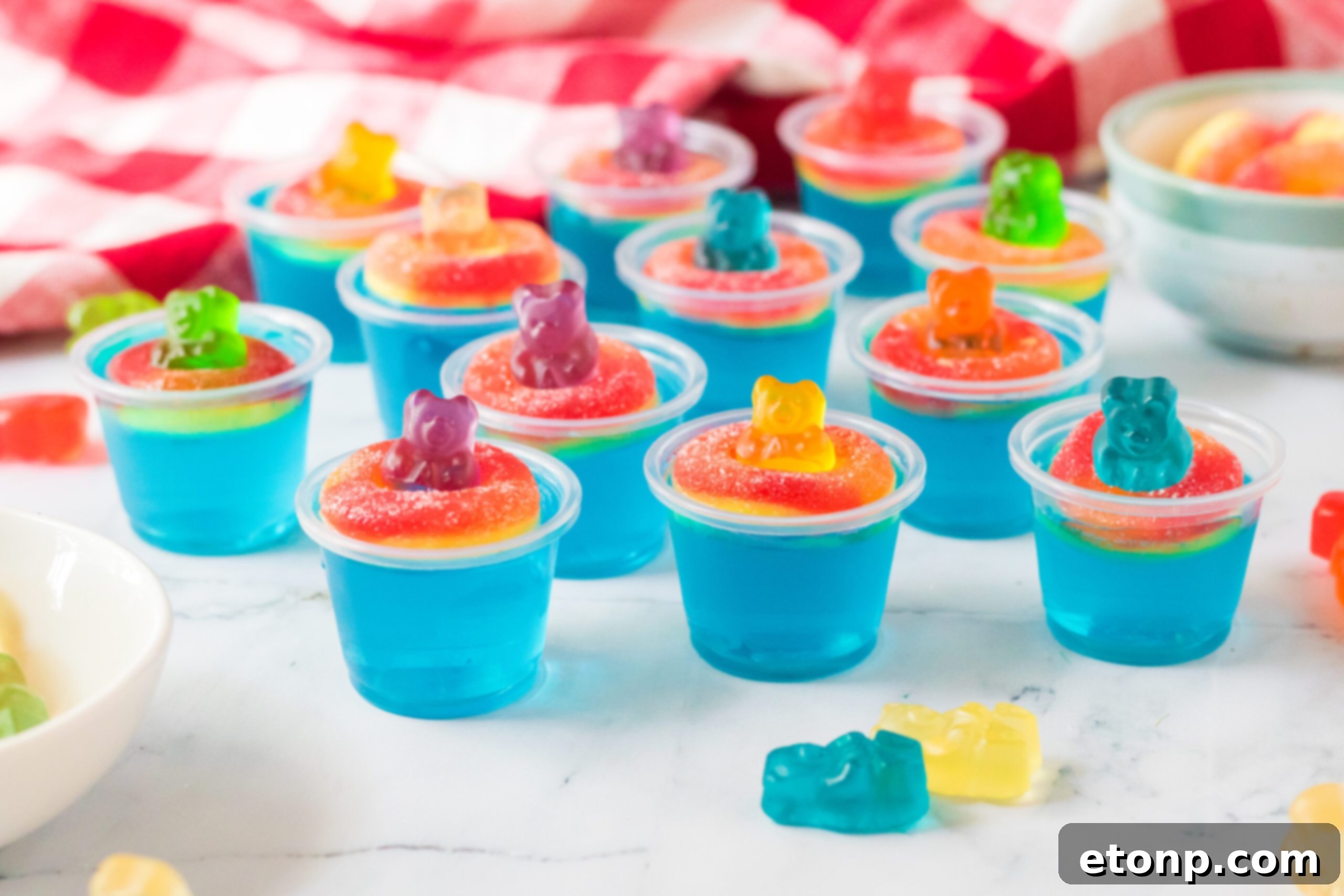 Summer Splash Jello Shots 9 Pool Party Jello Shots on a white marble table