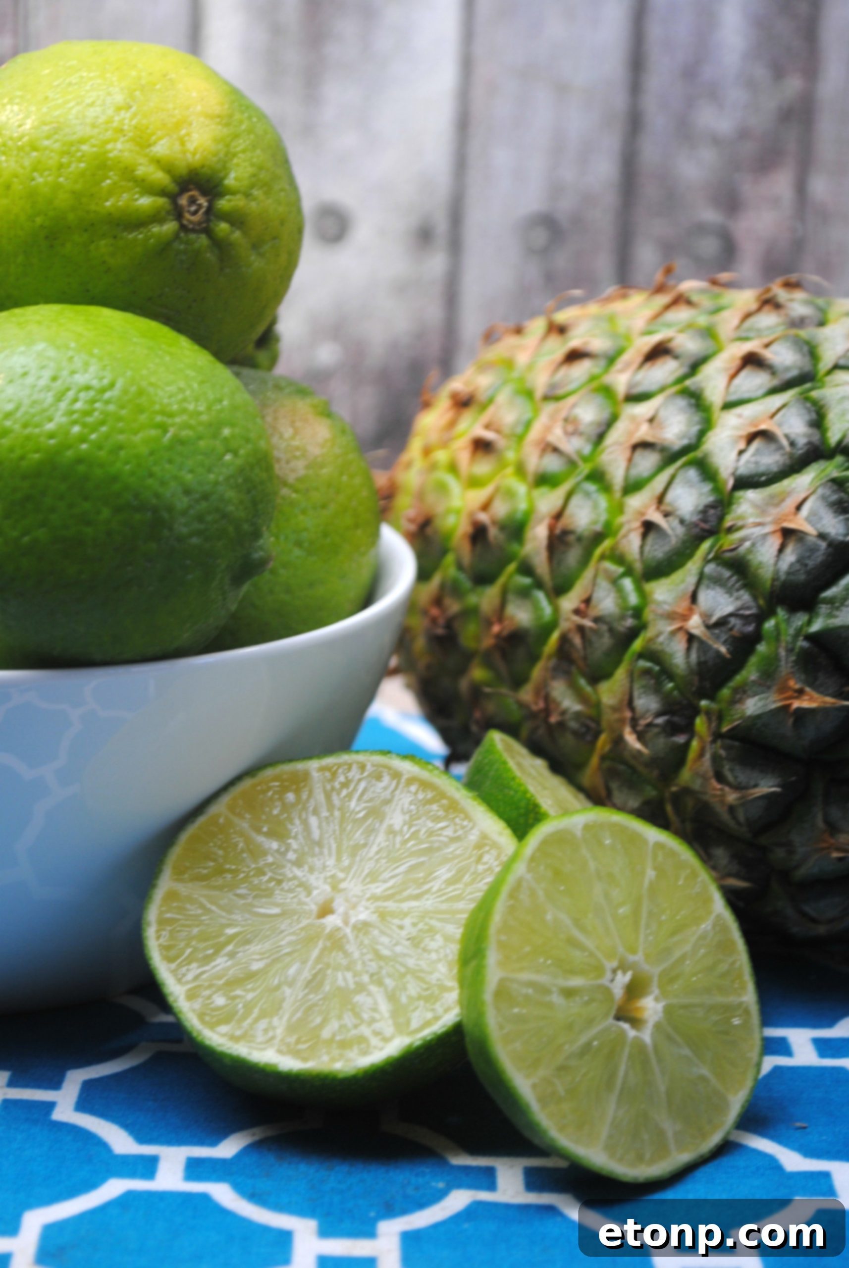 Another perspective of a Kinky Pineapple Margarita, emphasizing its refreshing qualities.
