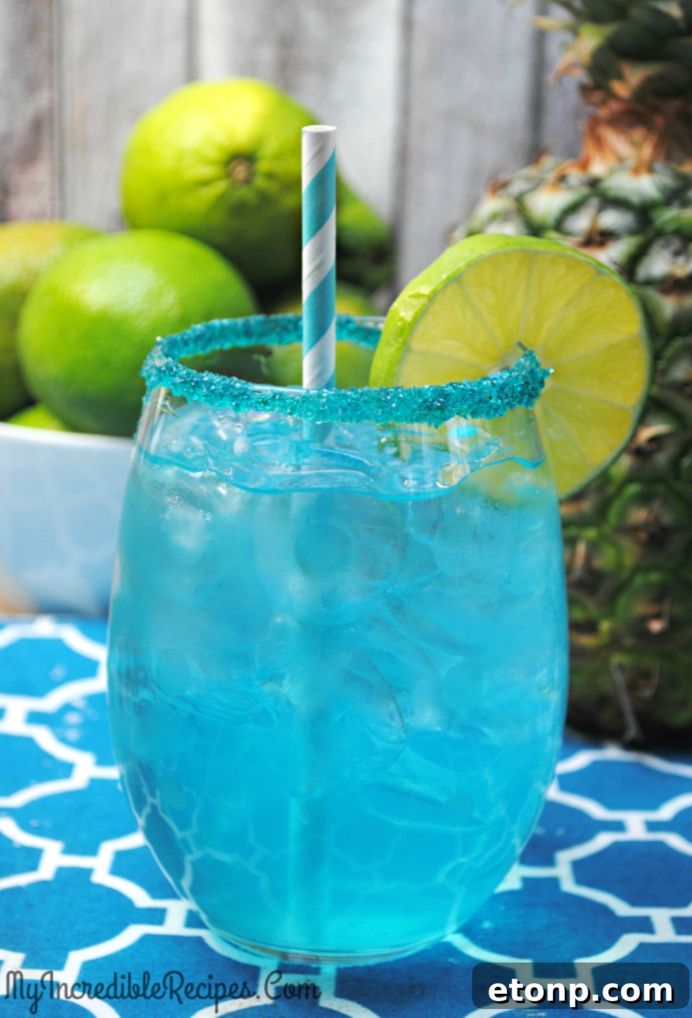 Enjoying a Kinky Pineapple Margarita with friends on a sunny day.