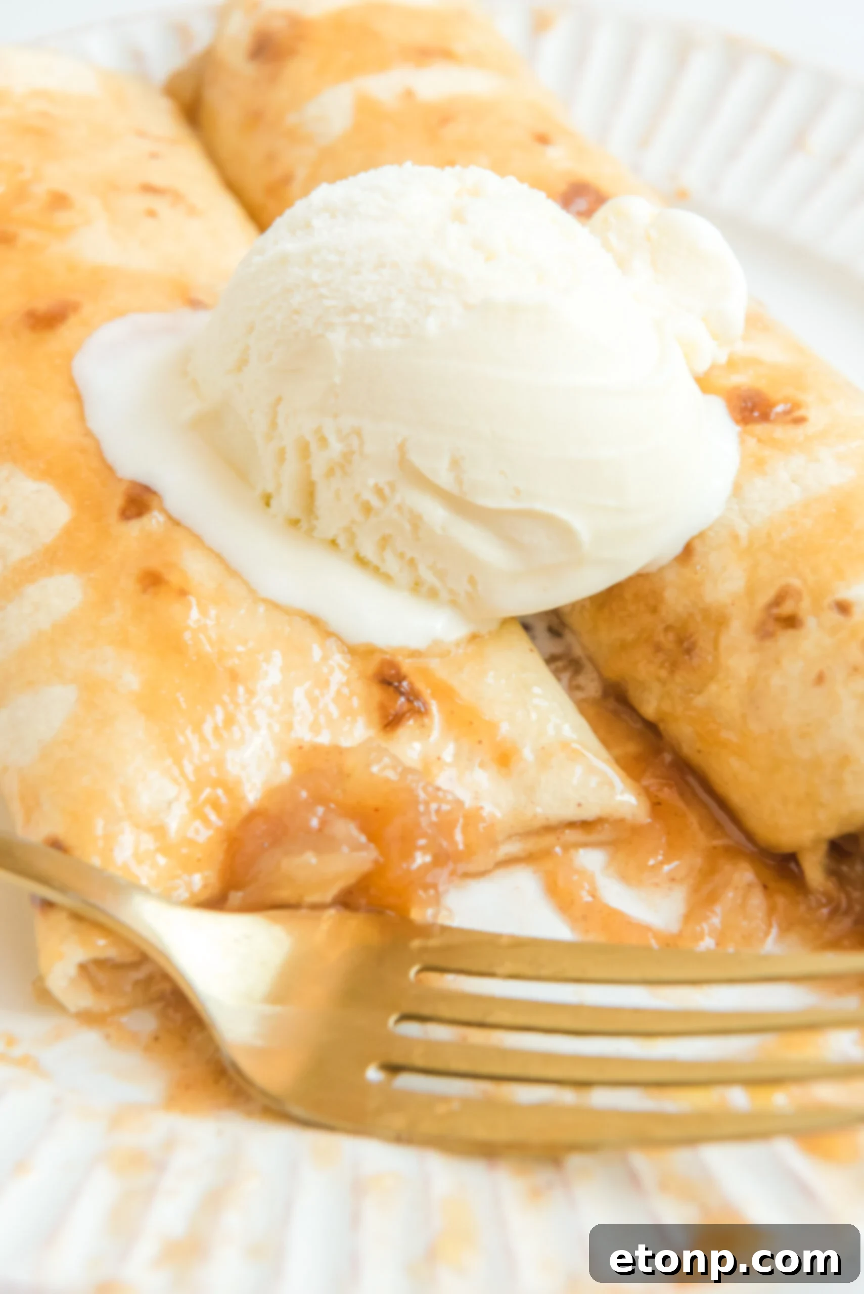 Cinnamon Apple Enchilada Bake 13 Apple Pie Enchiladas topped with vanilla ice cream