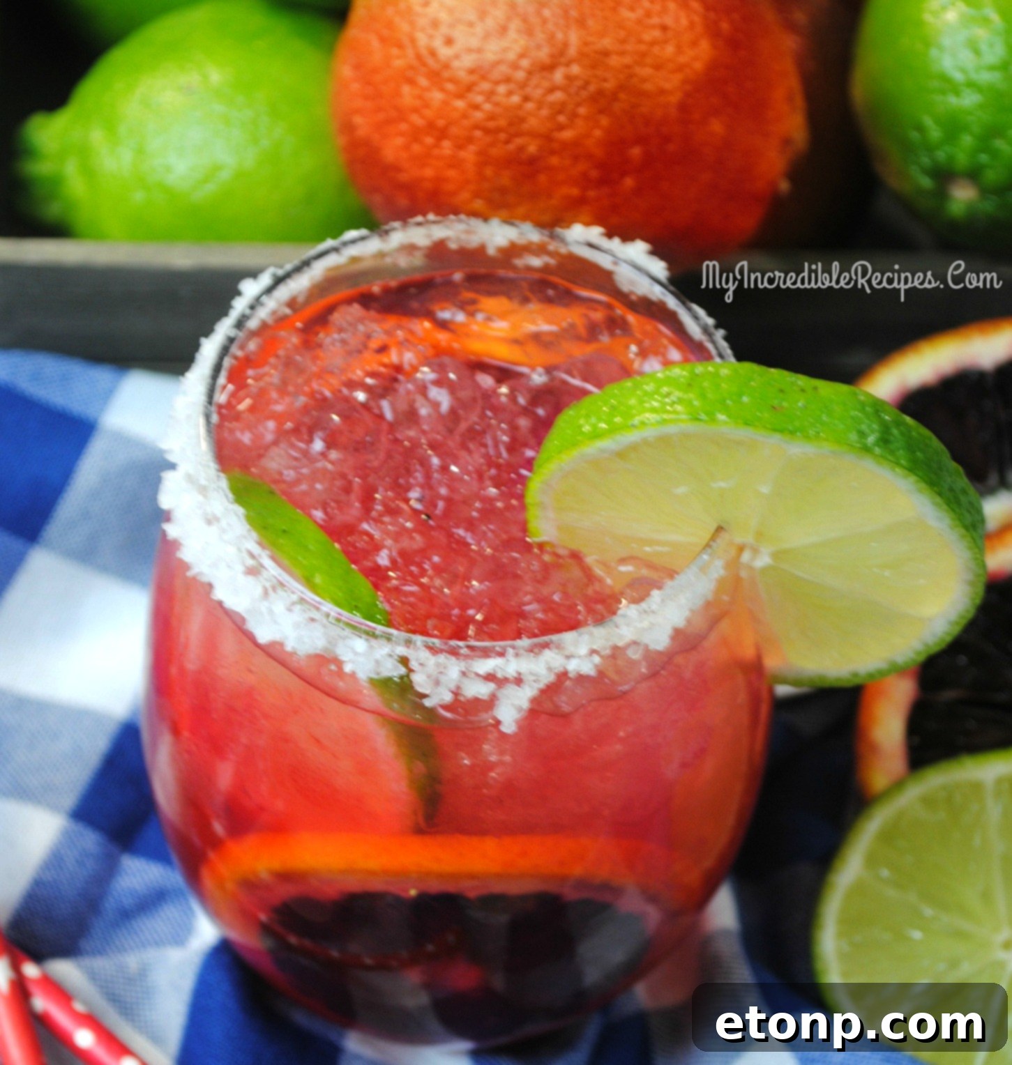 Multiple Blood Orange Margaritas arranged beautifully for a party.