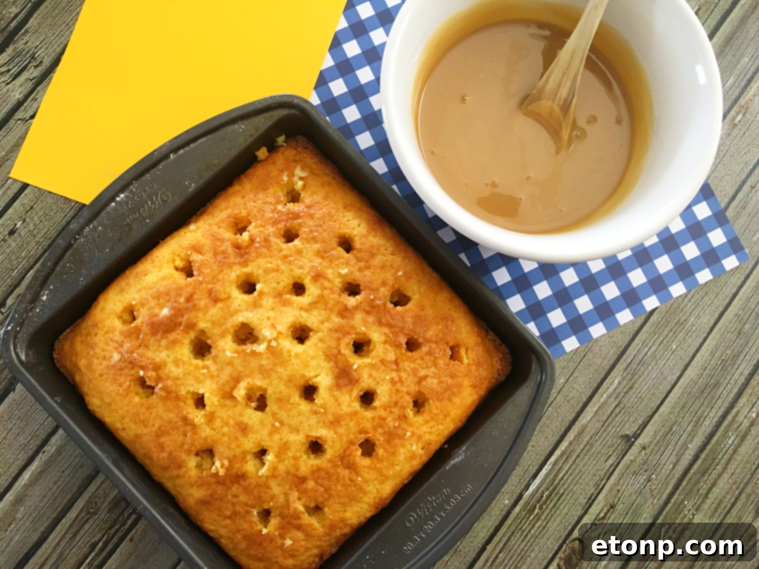 Butterfinger Bliss Cake 5 caramel syrup and sweetened condensed milk for poke cake
