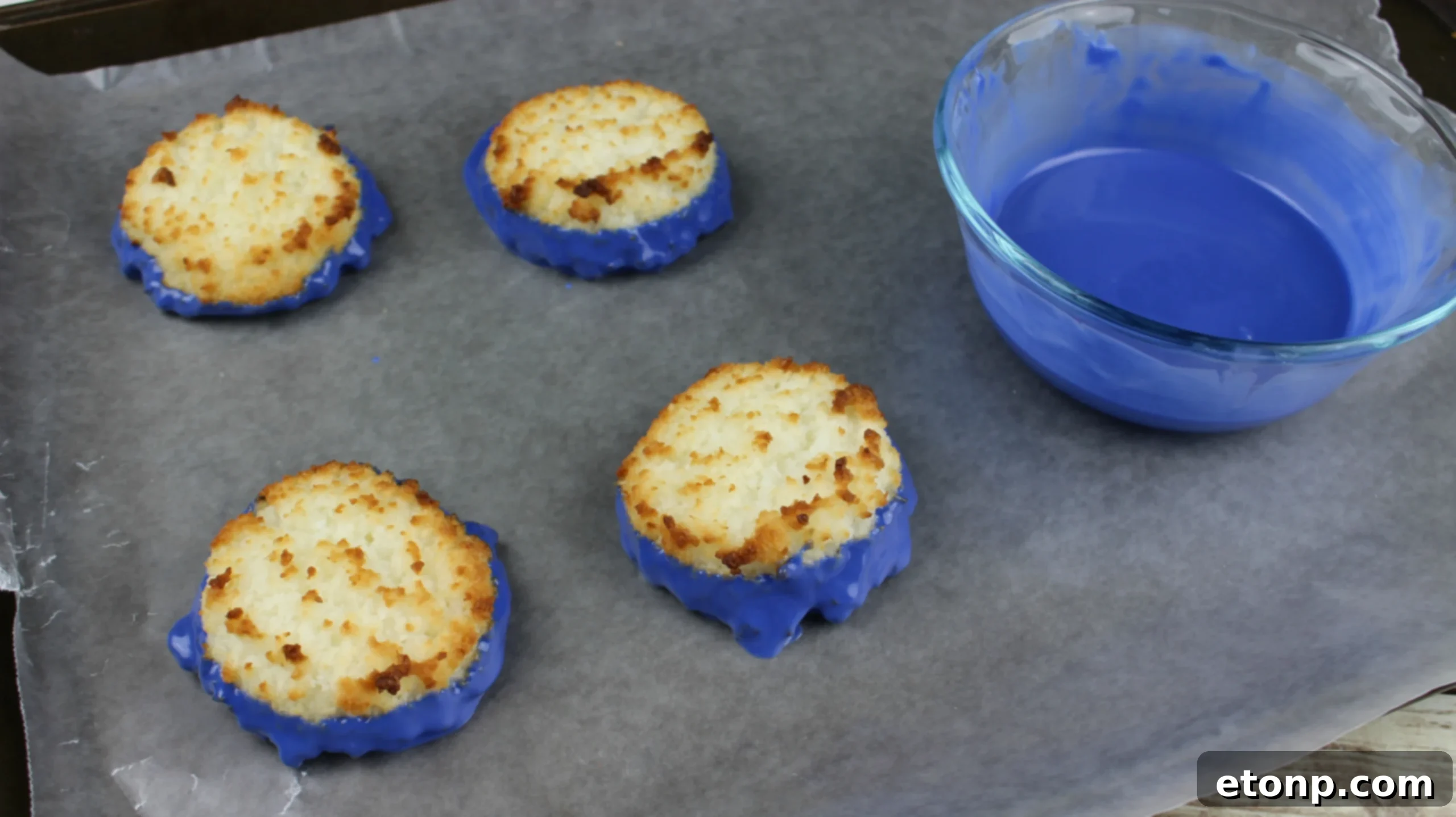 Melted blue chocolate in a double boiler, ready for dipping macaroons