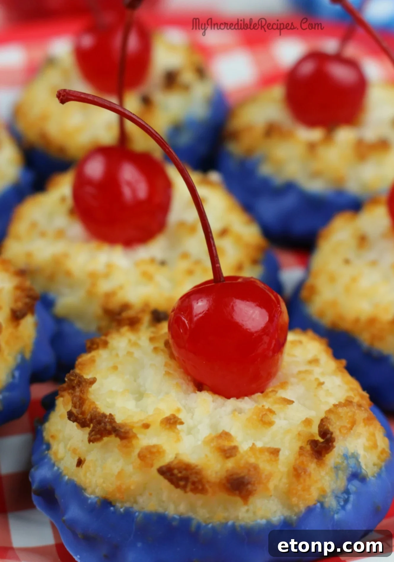 Close-up of a perfectly baked coconut macaroon, showing its toasted golden edges