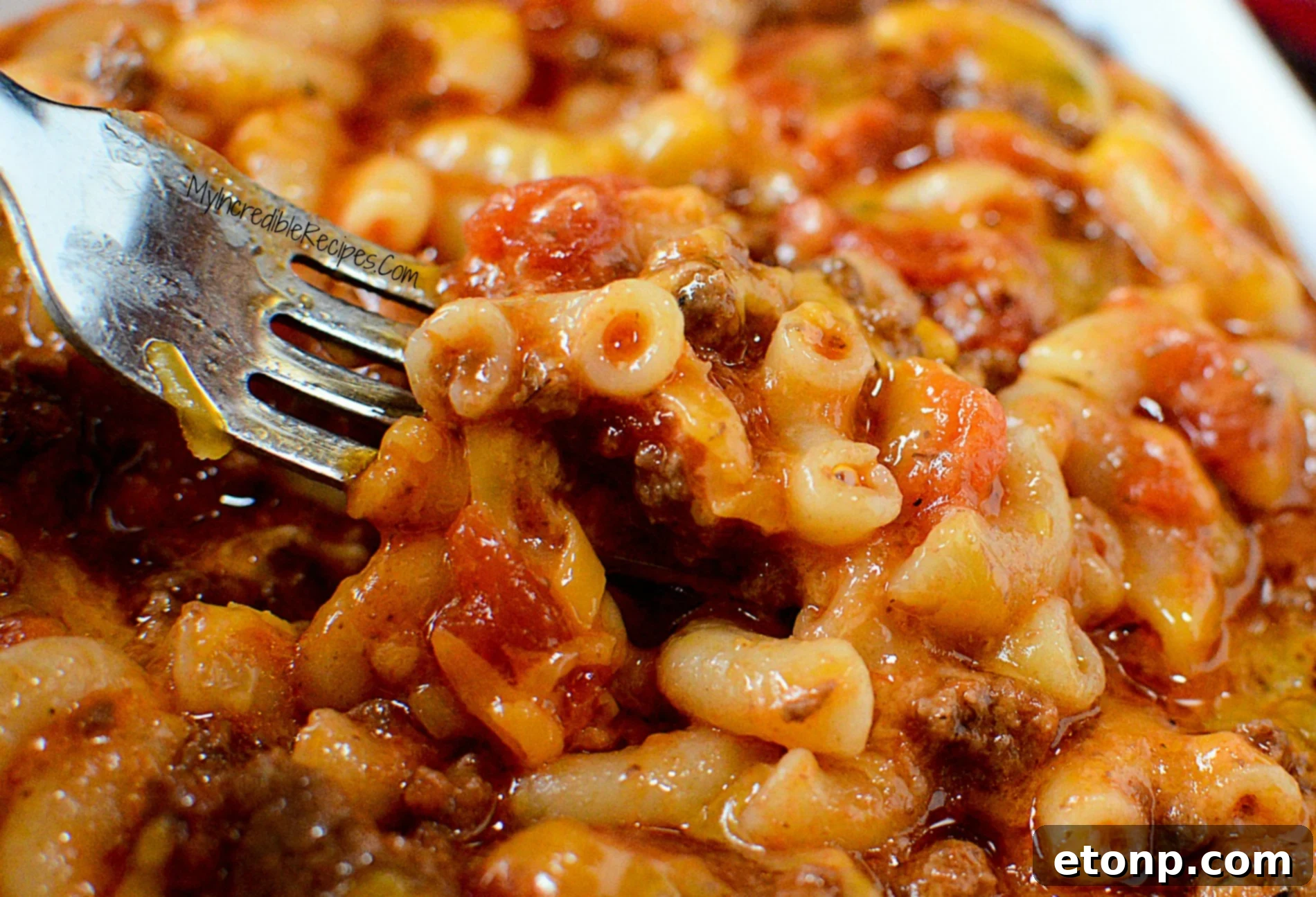 Homestyle Goulash 11 Old Fashioned Goulash close up of a fork lifting some up