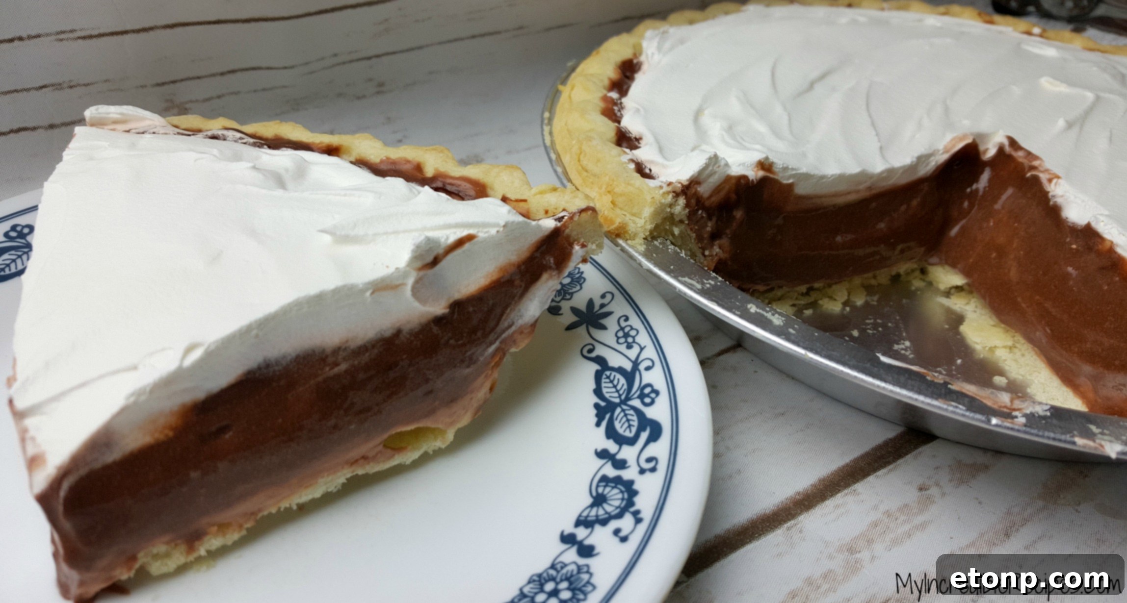 Chocolate cream pie cooling on a counter
