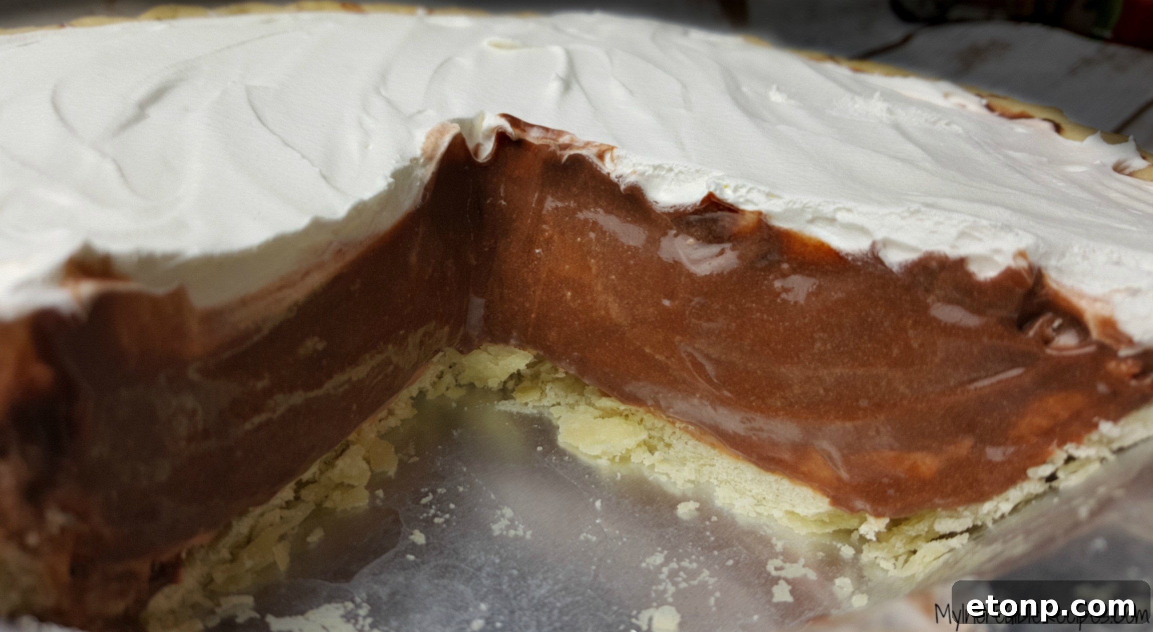 Pie crust being prepared for filling