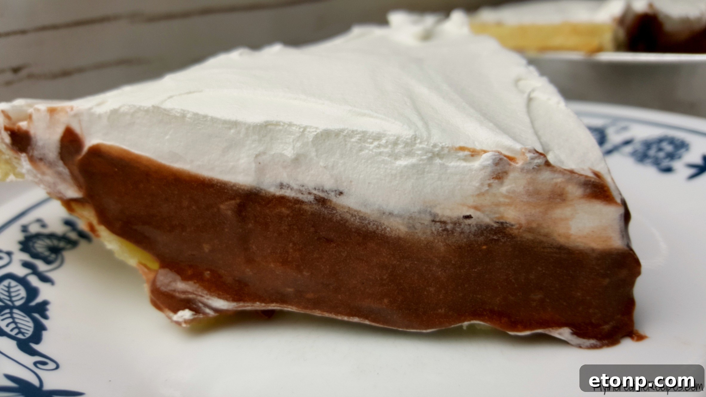 Pouring chocolate filling into pie crust