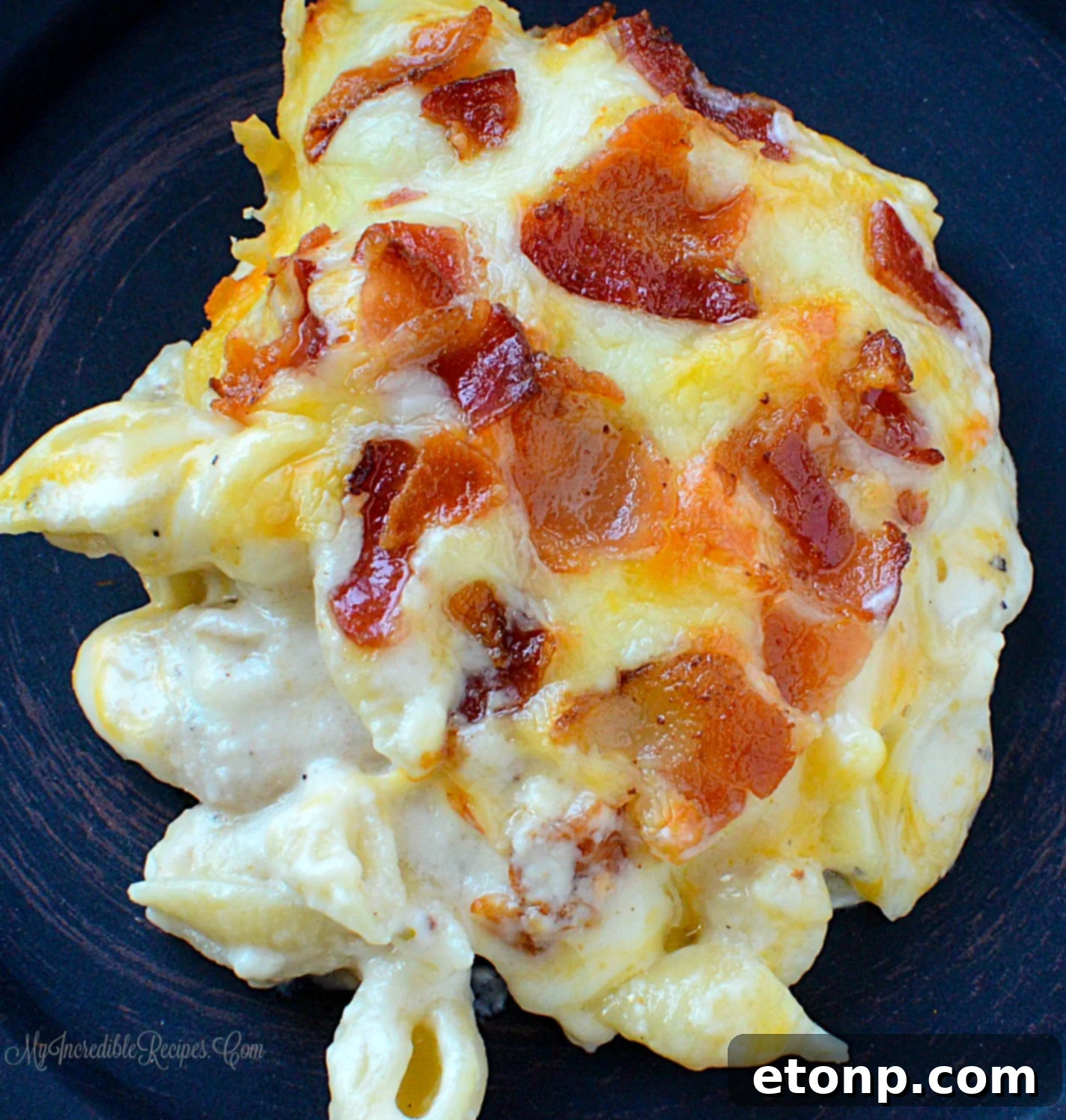 Ultimate Chicken Bacon Ranch Bake 11 Scooping a generous portion of Chicken Bacon Ranch Casserole