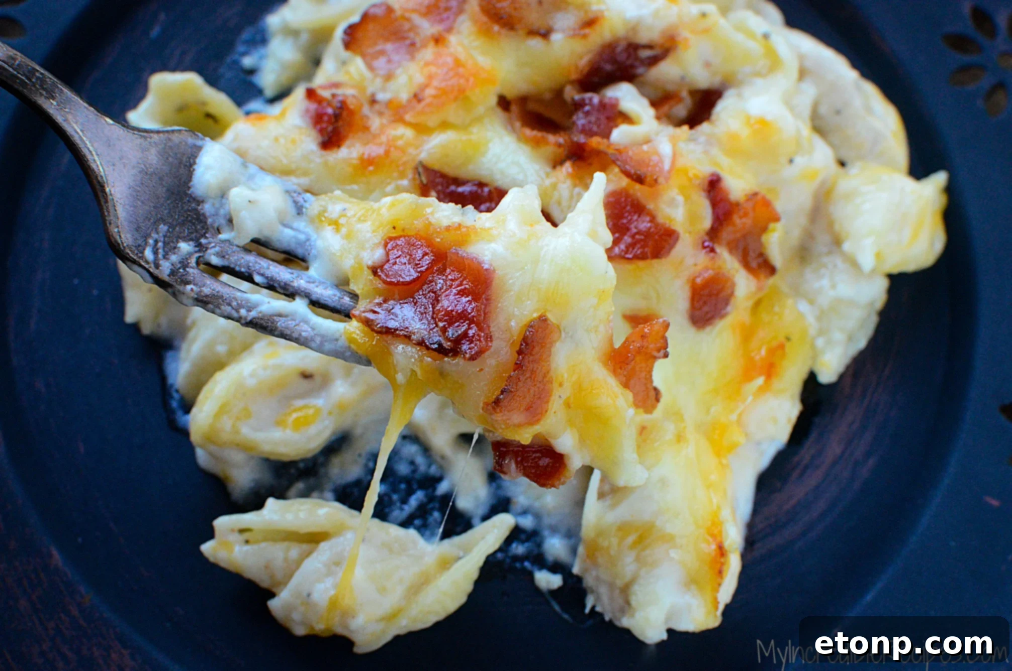 Ultimate Chicken Bacon Ranch Bake 12 Closeup of Chicken Bacon Ranch Casserole with a fork