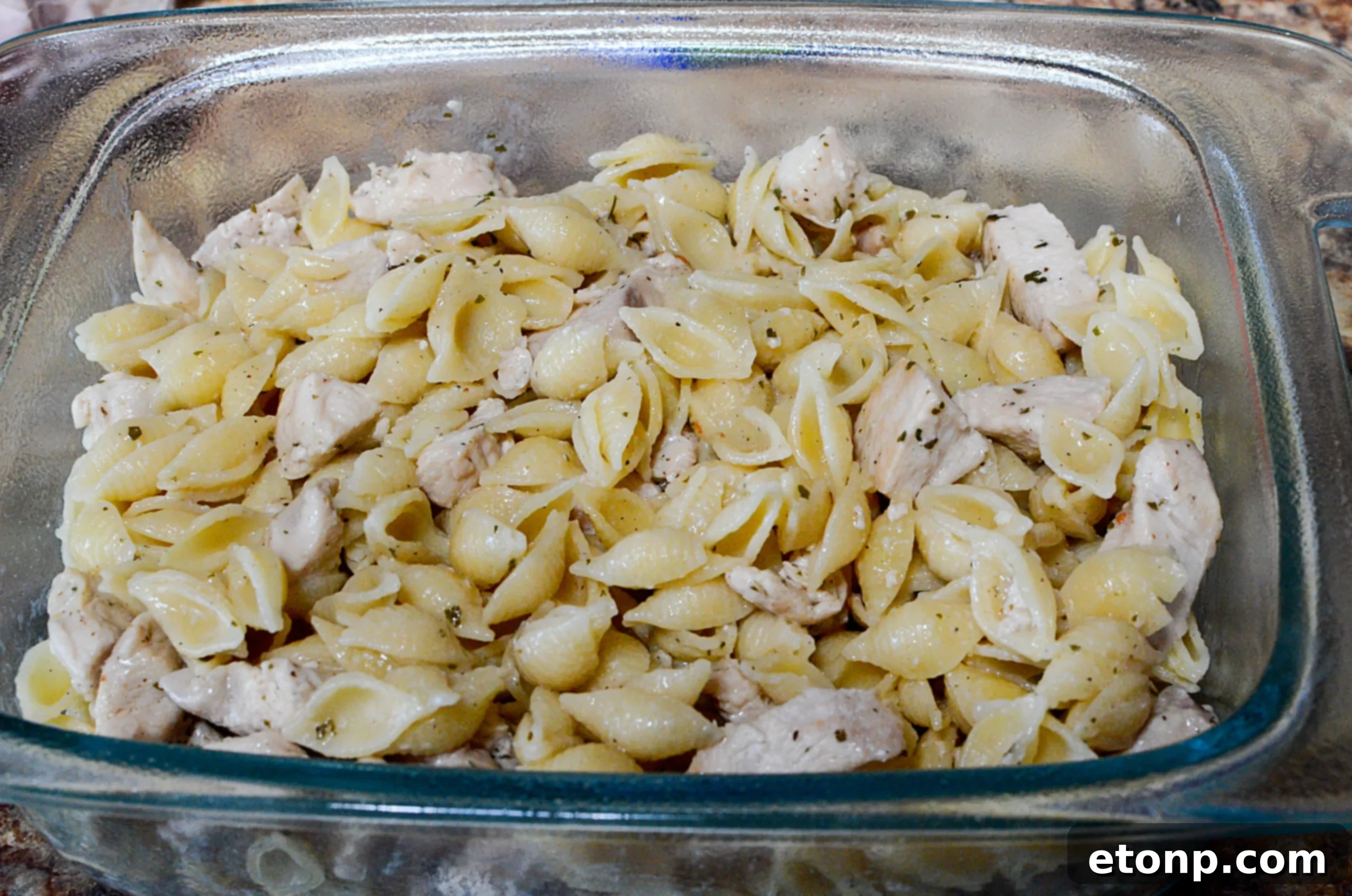 Ultimate Chicken Bacon Ranch Bake 3 Close-up of marinated chicken pieces for casserole
