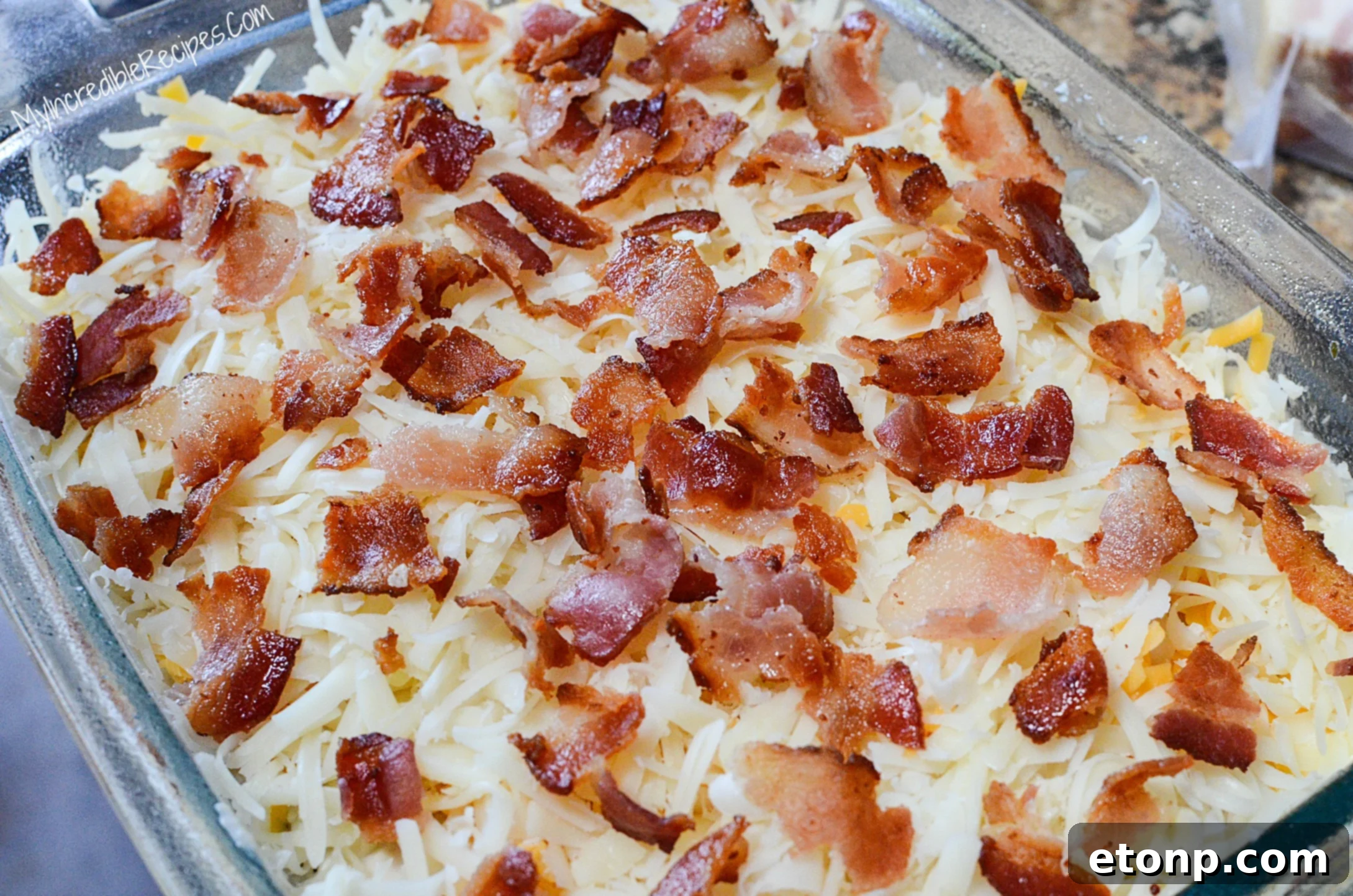 Ultimate Chicken Bacon Ranch Bake 4 Mixing ingredients in a large bowl for Chicken Bacon Ranch Casserole