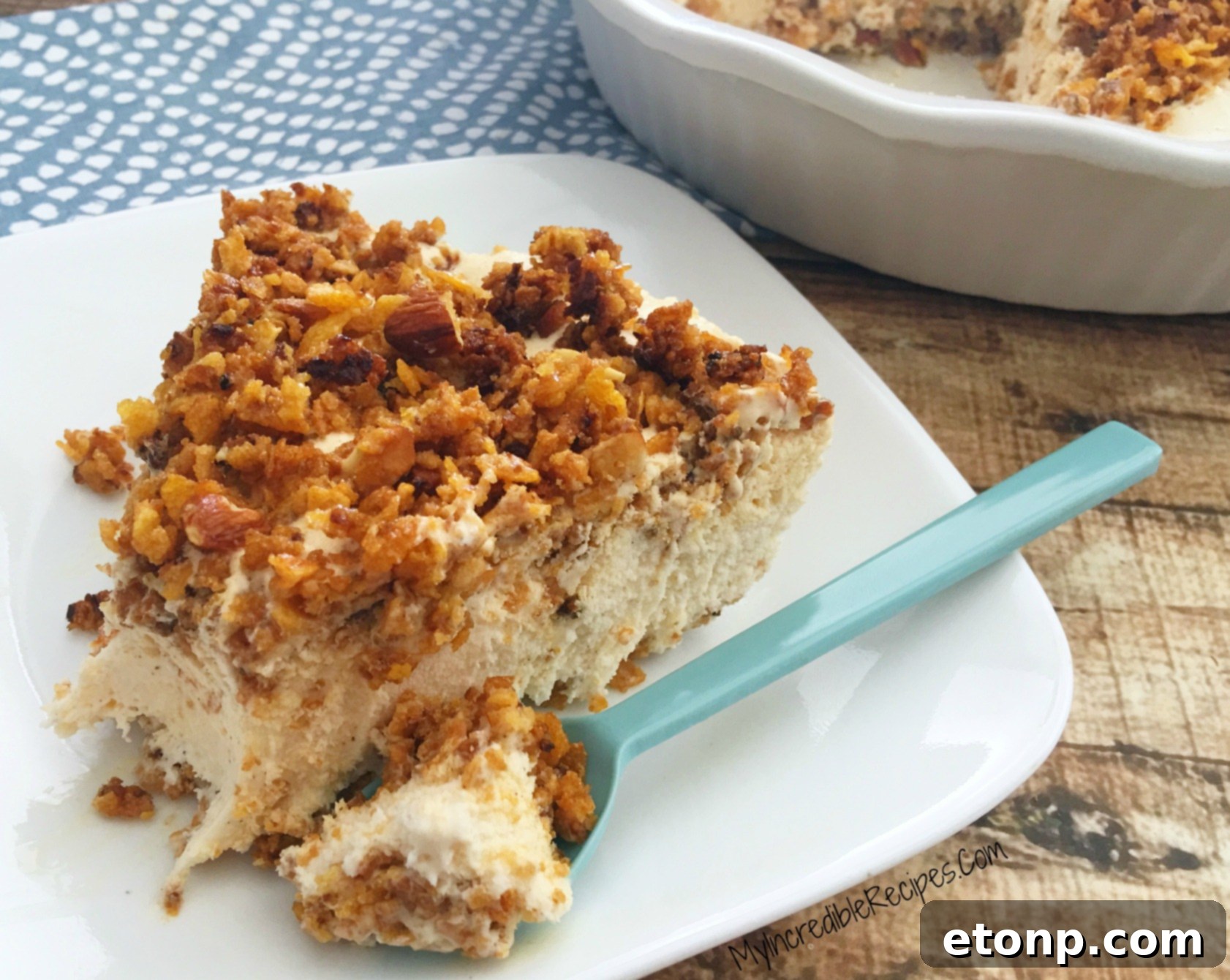 A beautifully presented slice of no-bake fried ice cream pie on a plate, garnished subtly.