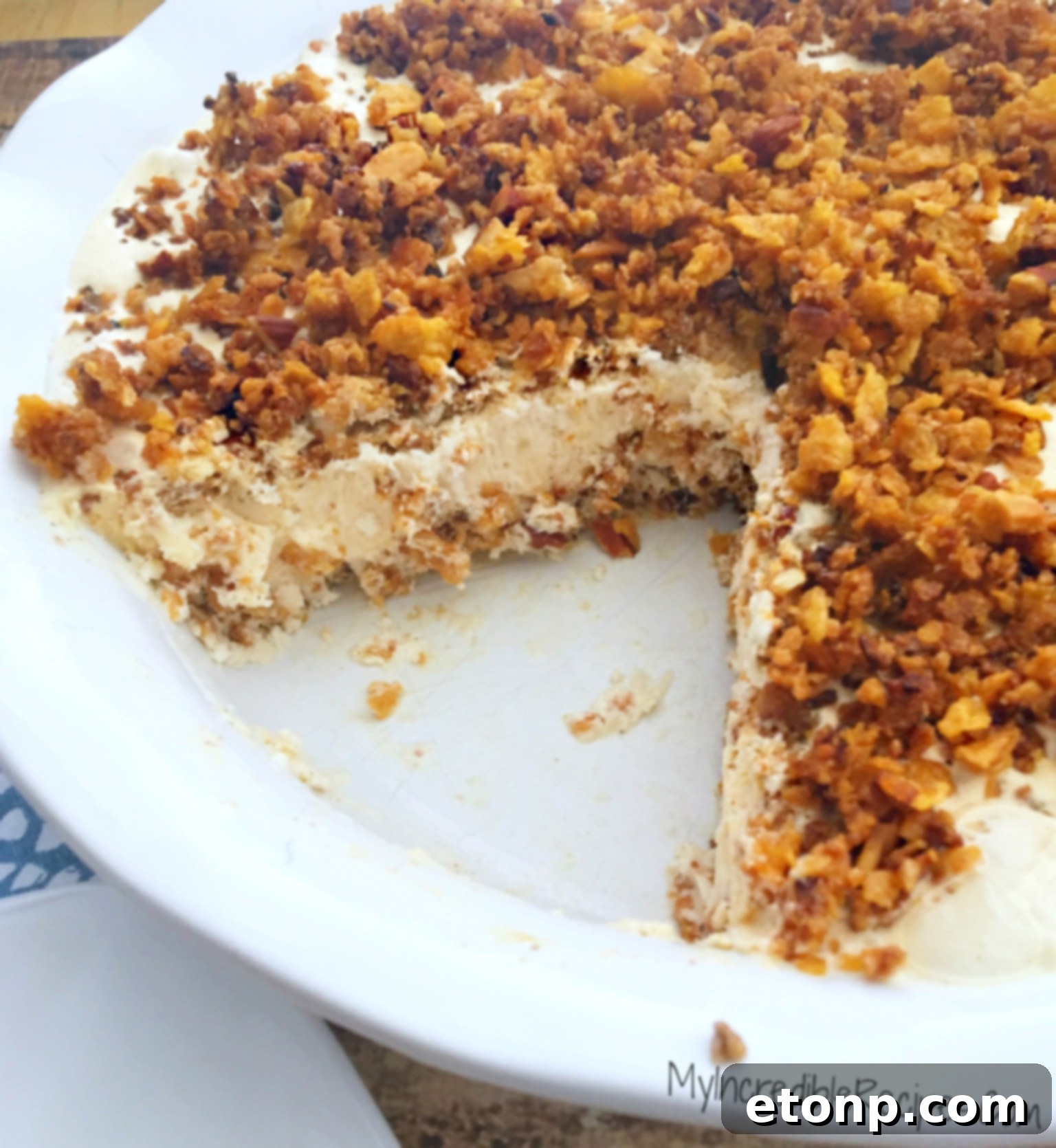Close-up of the finished no-bake fried ice cream pie, showcasing its golden, crunchy topping.