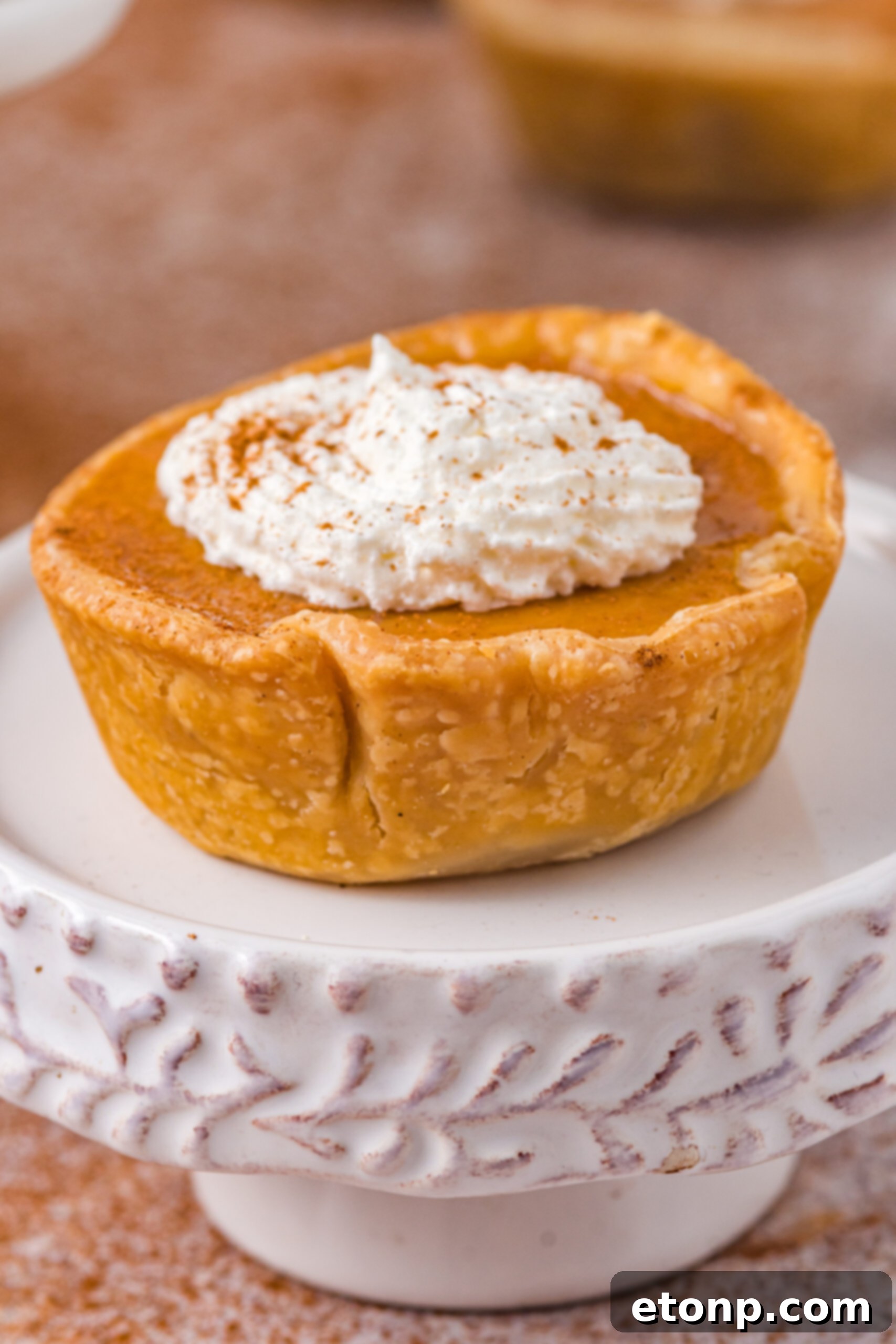 Mini Pumpkin Pie on a white cake stand 