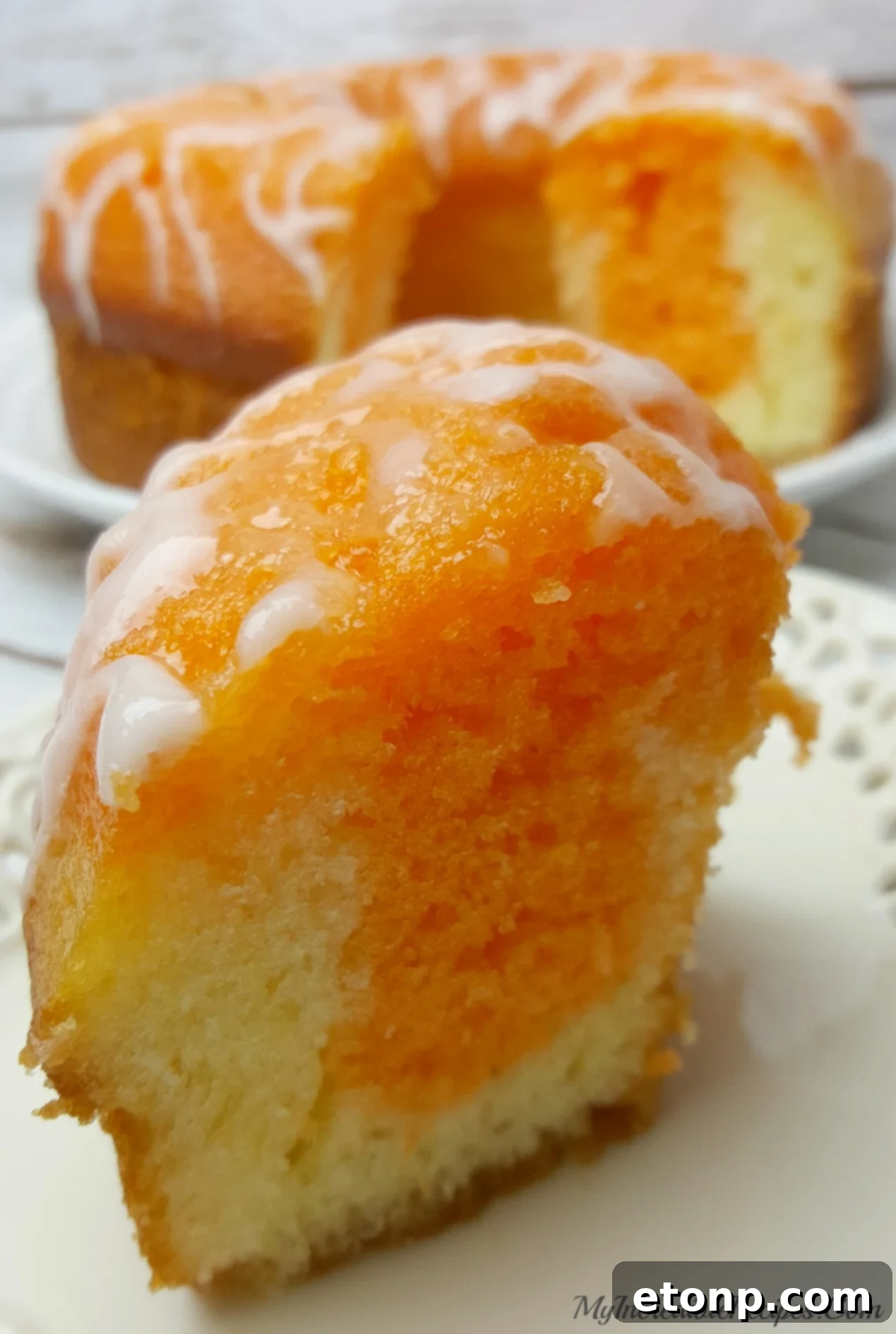 Orange Creamsicle Cake on a cooling rack