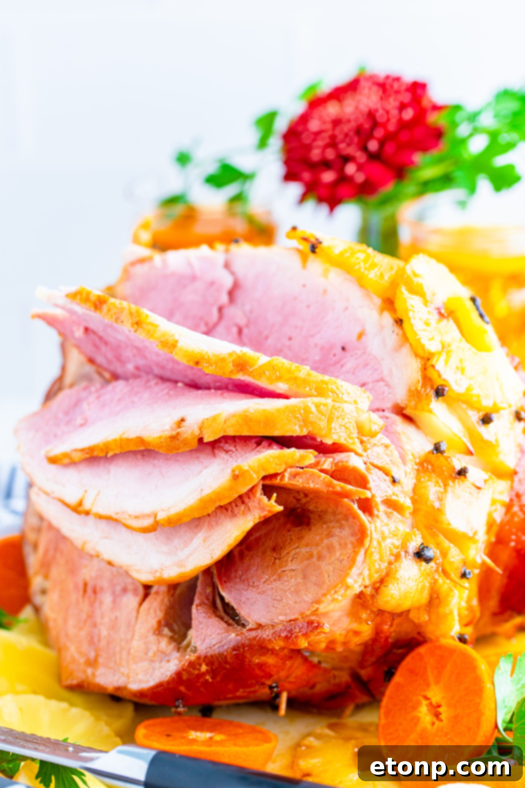 Side image showing the slices of the full baked ham. 
