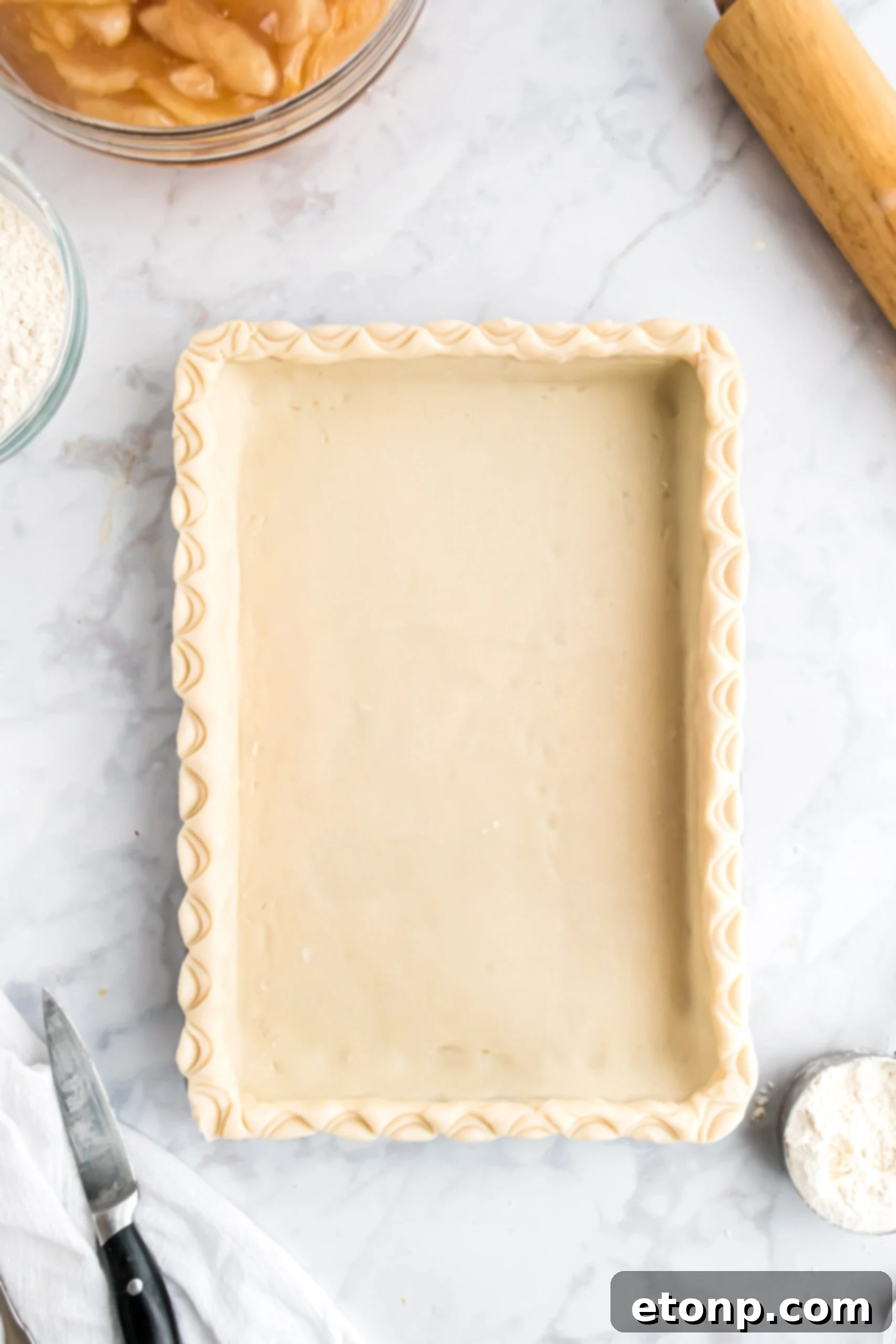 Overhead shot of unbaked pie crust. 