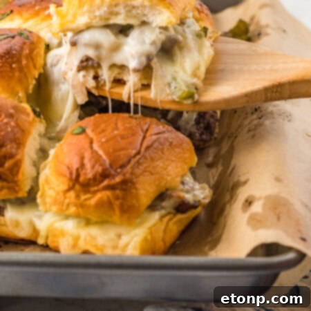 Philly Cheesesteak Sliders on a baking sheet
