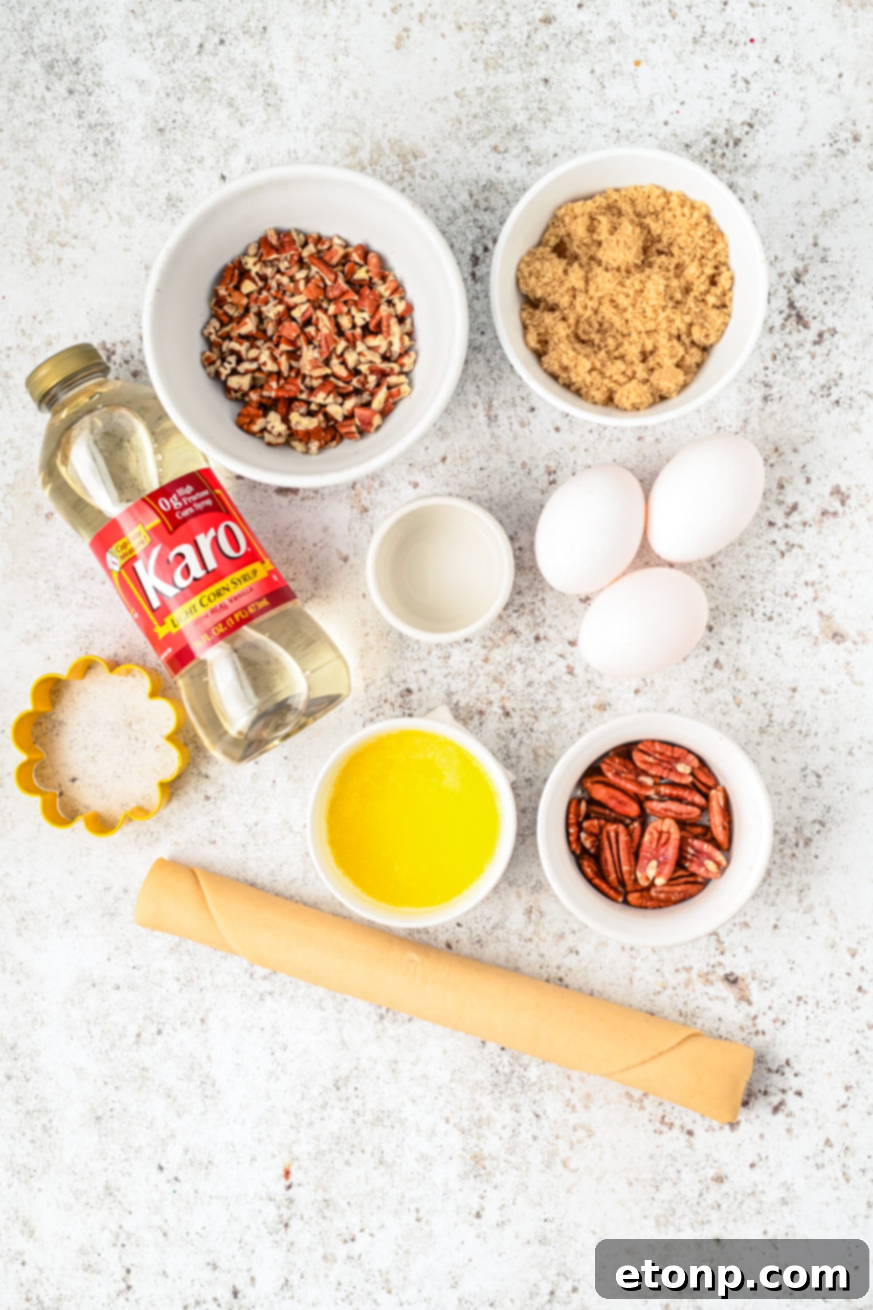An organized overhead view of all the fresh ingredients meticulously laid out, ready for preparing this delightful recipe.