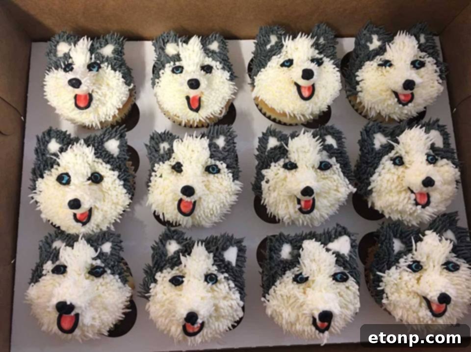 Incredibly adorable husky dog cupcakes with detailed frosting features, capturing the charm of the breed.