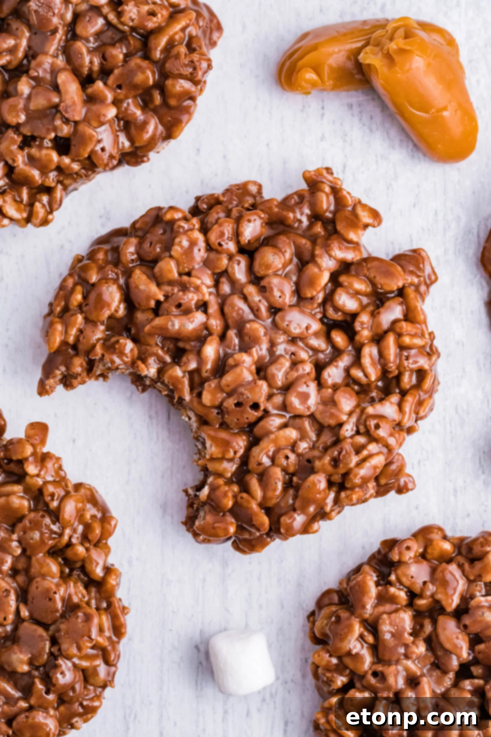 Overhead view of a cookie with a bite removed. 